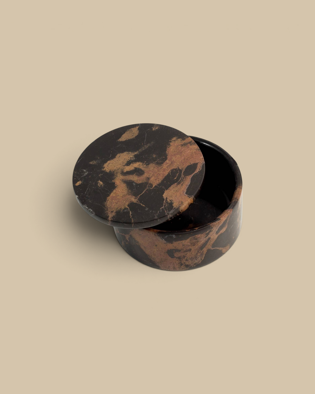 Homestyle Collective round marble box with deep brown and black tiger eye patterns for jewelry storage