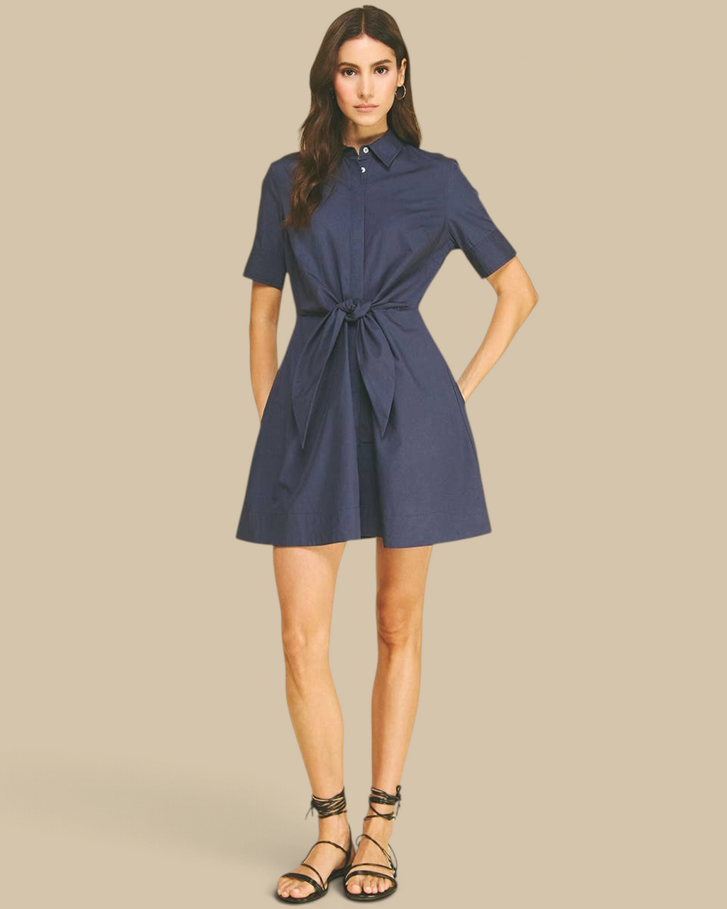 Homestyle Collective navy mini dress with a collar, short sleeves, and a tie-front detail on a model.