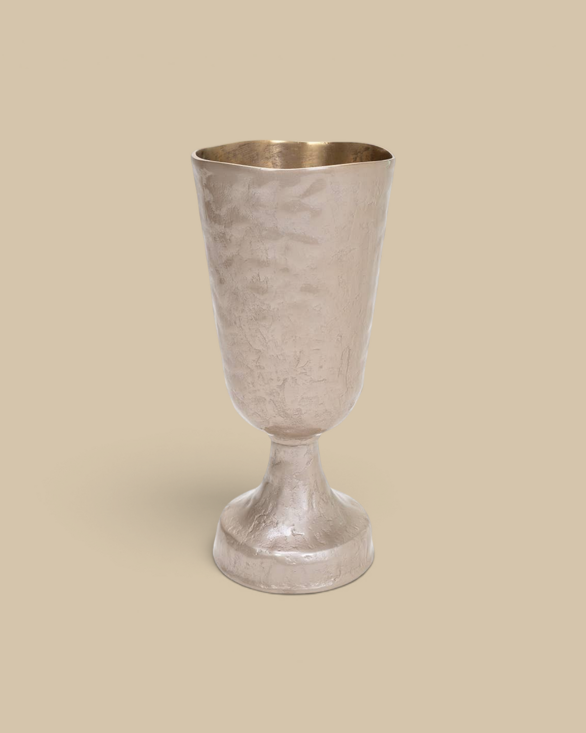 Homestyle Collective Verlix tall silver aluminum urn with a hammered texture and elegant pedestal base.
