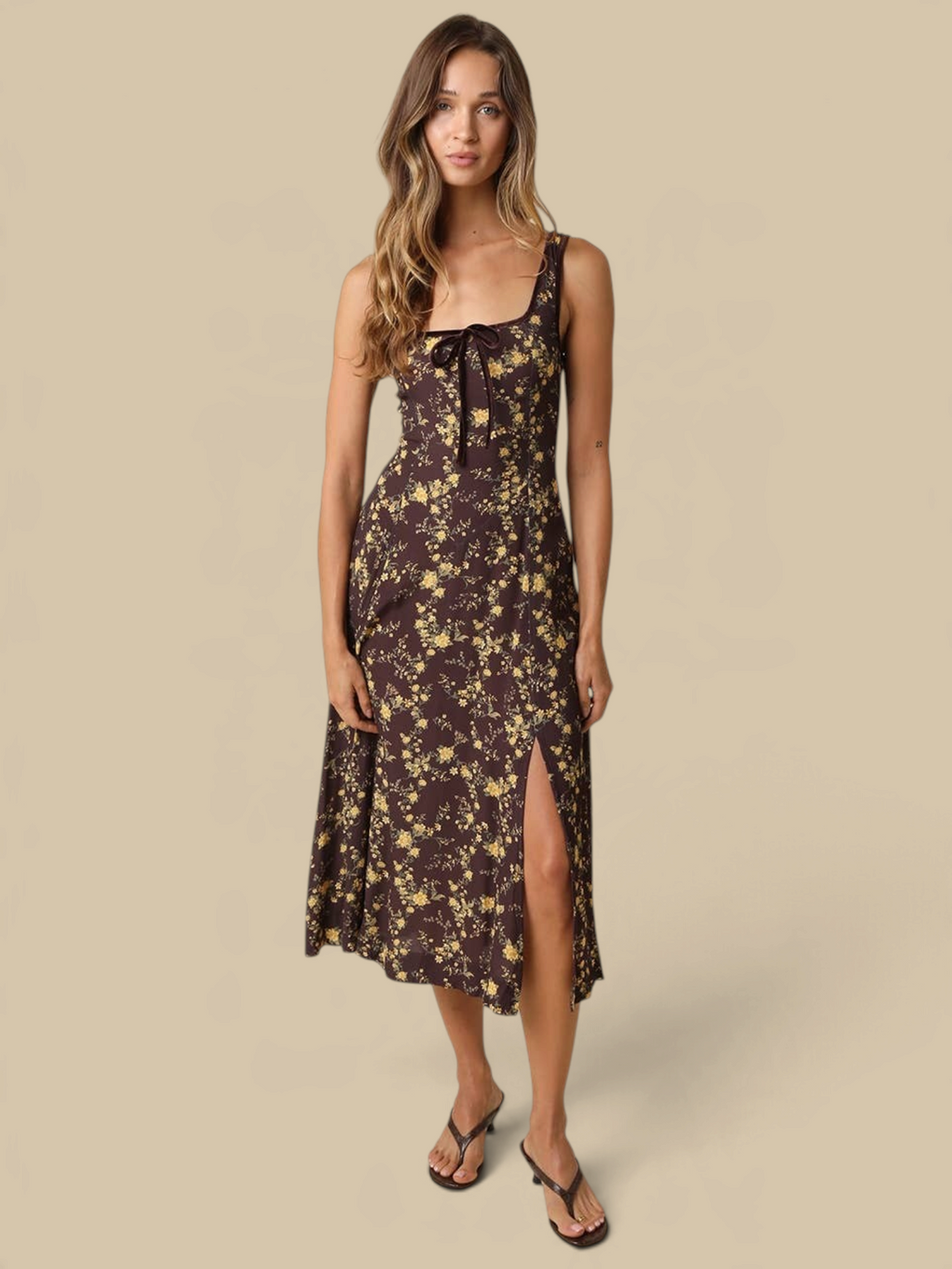 Homestyle Collective Sofia floral midi dress with square neckline, front bow, and side slit in brown and yellow