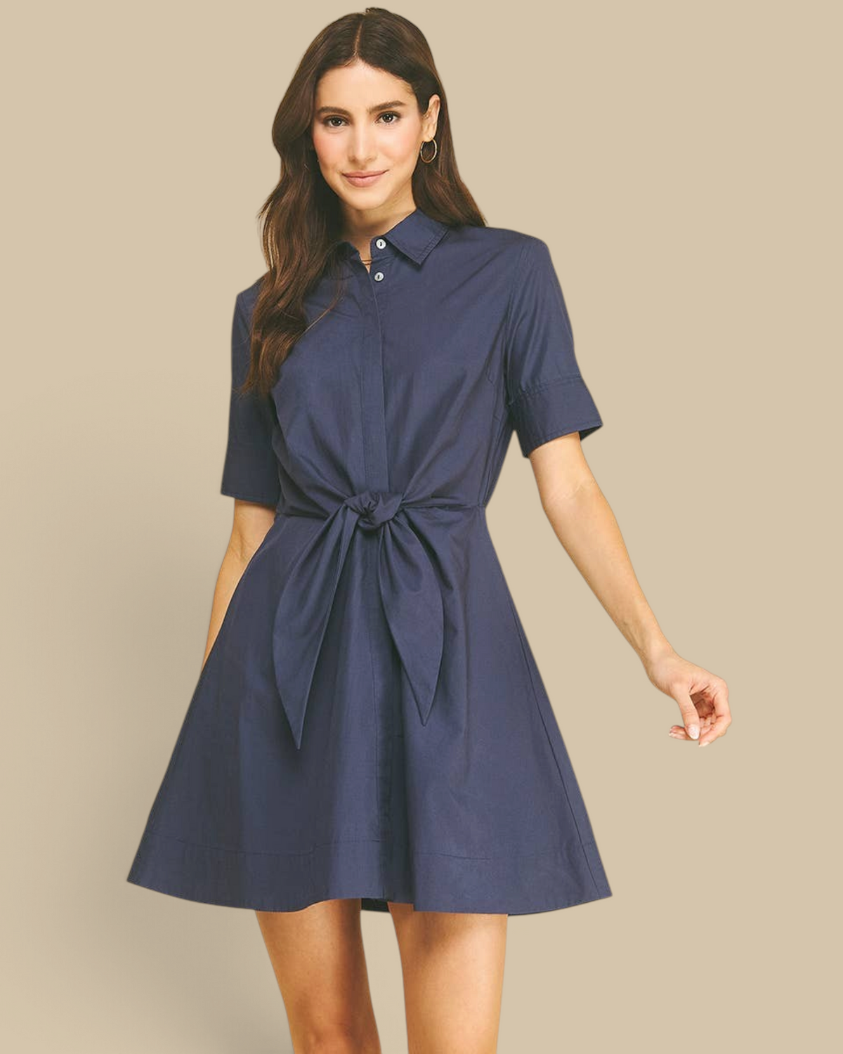 Homestyle Collective navy A-line mini dress with a collar, short sleeves, and a tie-front detail on a model.