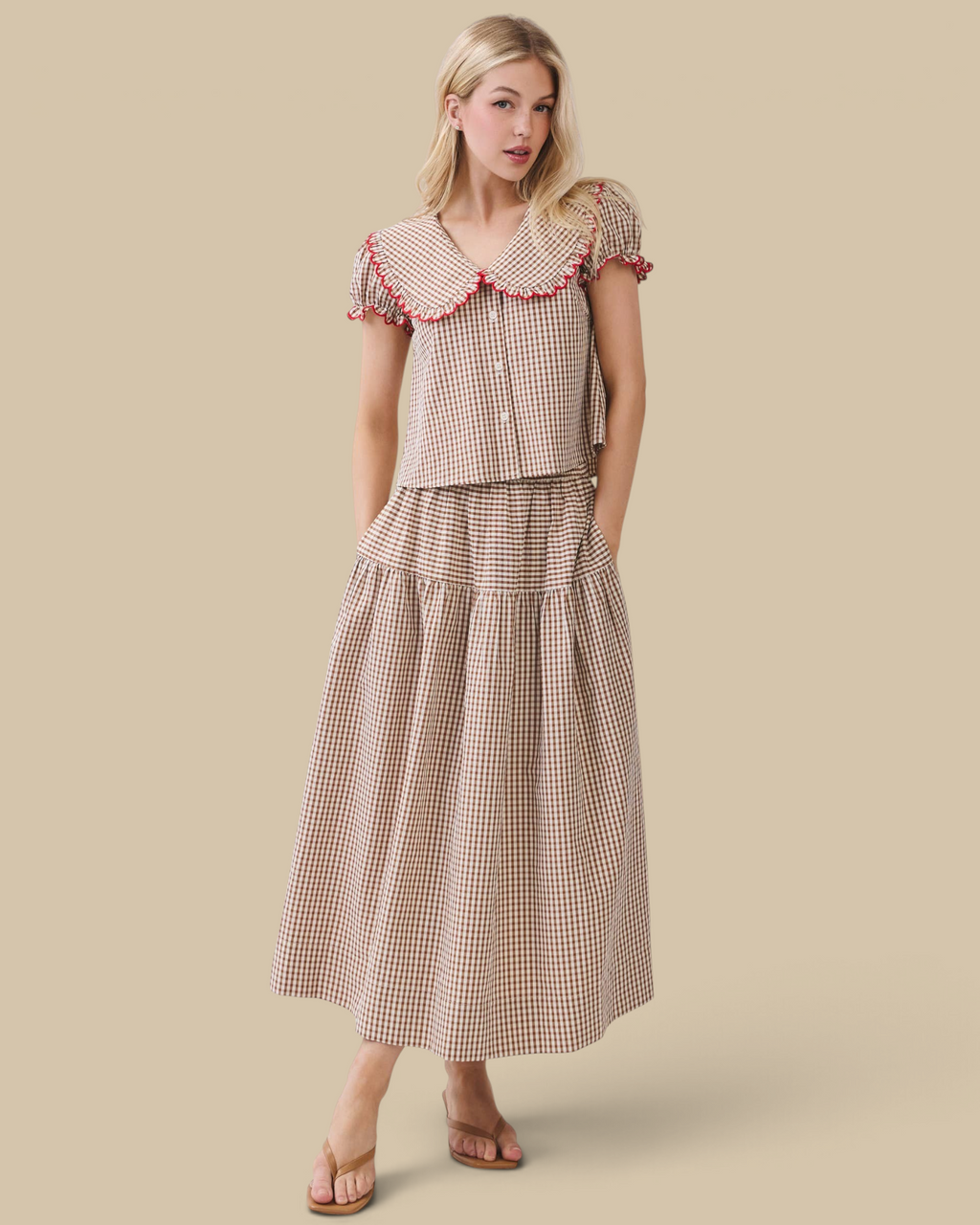 Homestyle Collective two-piece gingham set featuring a blouse with a Peter Pan collar and a flowy matching maxi skirt.