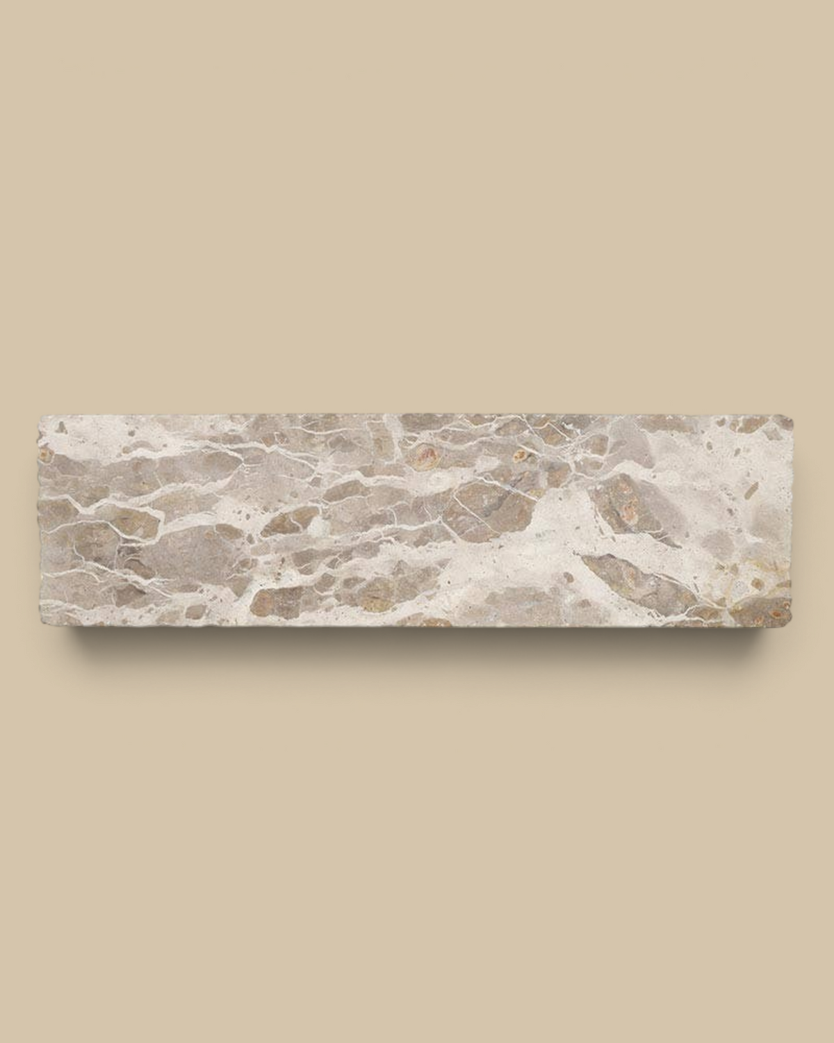 Homestyle Collective beige marble pedestal stand with natural veining for decorative display