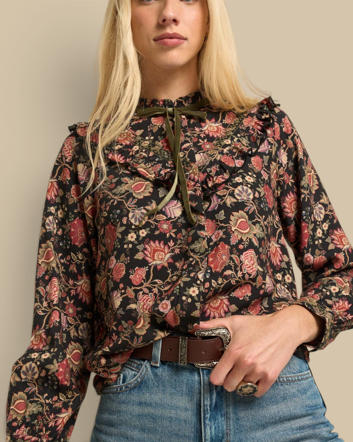 Homestyle Collective Hazel blouse in black floral viscose with ruffle yoke, embroidery, and olive velvet neck tie.