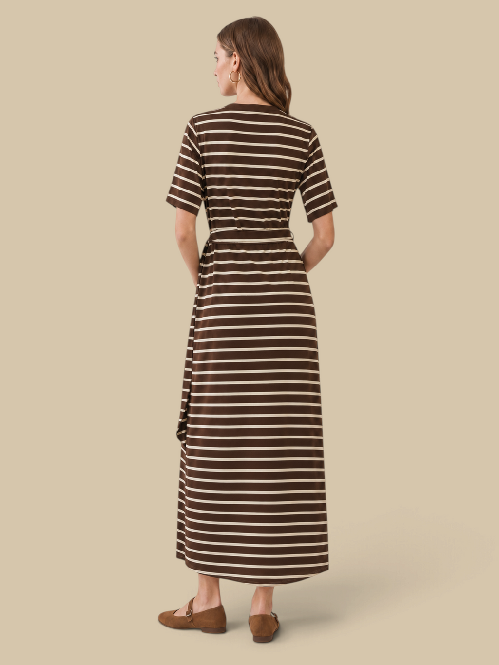 Homestyle Collective chocolate brown and white striped jersey maxi dress with waist tie, back view on a model.