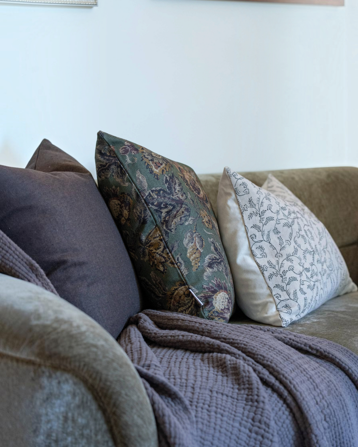 Homestyle Collective Corrine tapestry floral pillow cover in moody green, beige, and merlot linen-cotton blend.