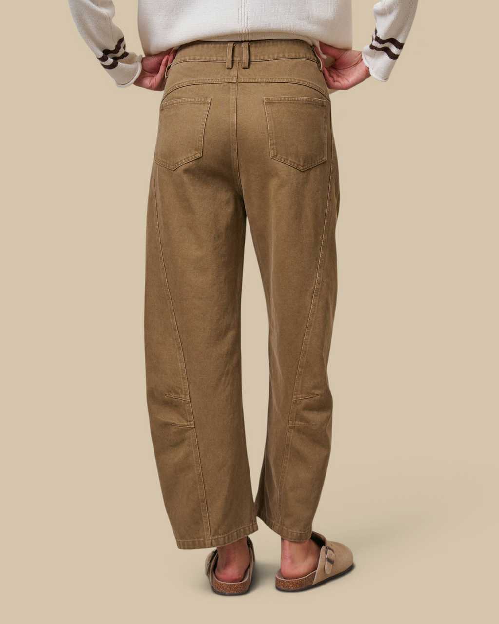 Back view of Homestyle Collective tan cotton barrel leg pants with a high-rise waist and cropped ankle length.