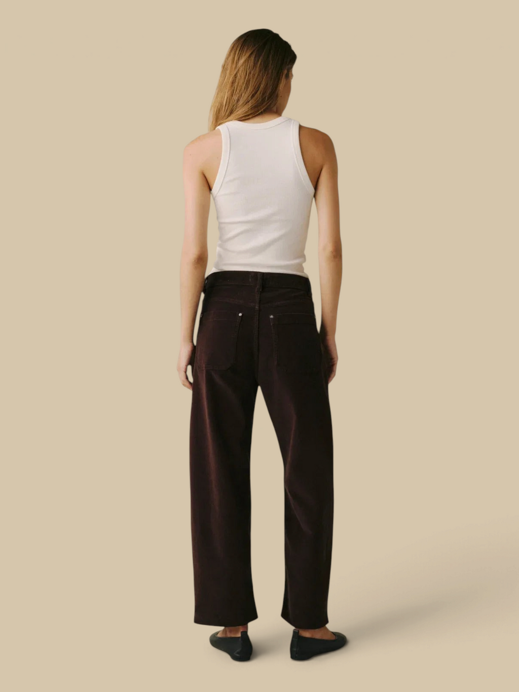 Homestyle Collective BNA soft curve barrel jeans in Americano brown corduroy, back view on a model.