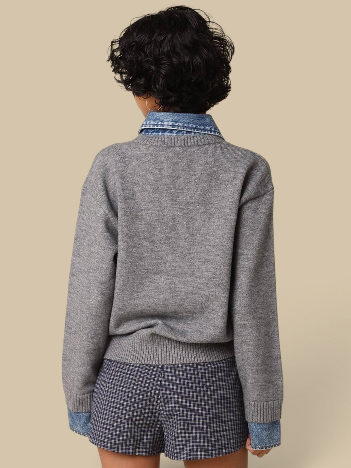 Back view of Homestyle Collective Emely grey knit sweater with denim collar and cuffs on a model