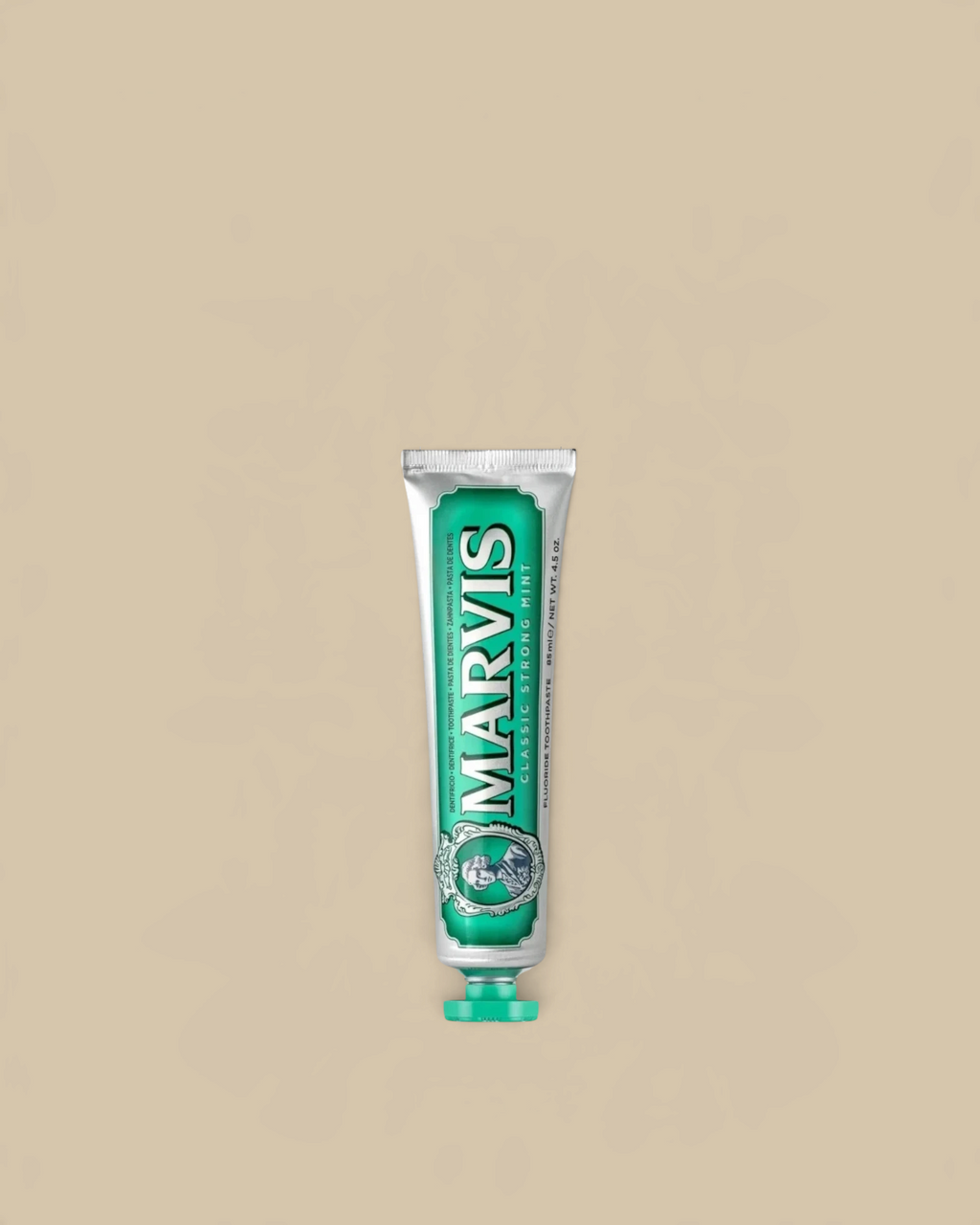 Homestyle Collective Marvis travel size toothpaste in a green and silver tube with classic strong mint flavor.
