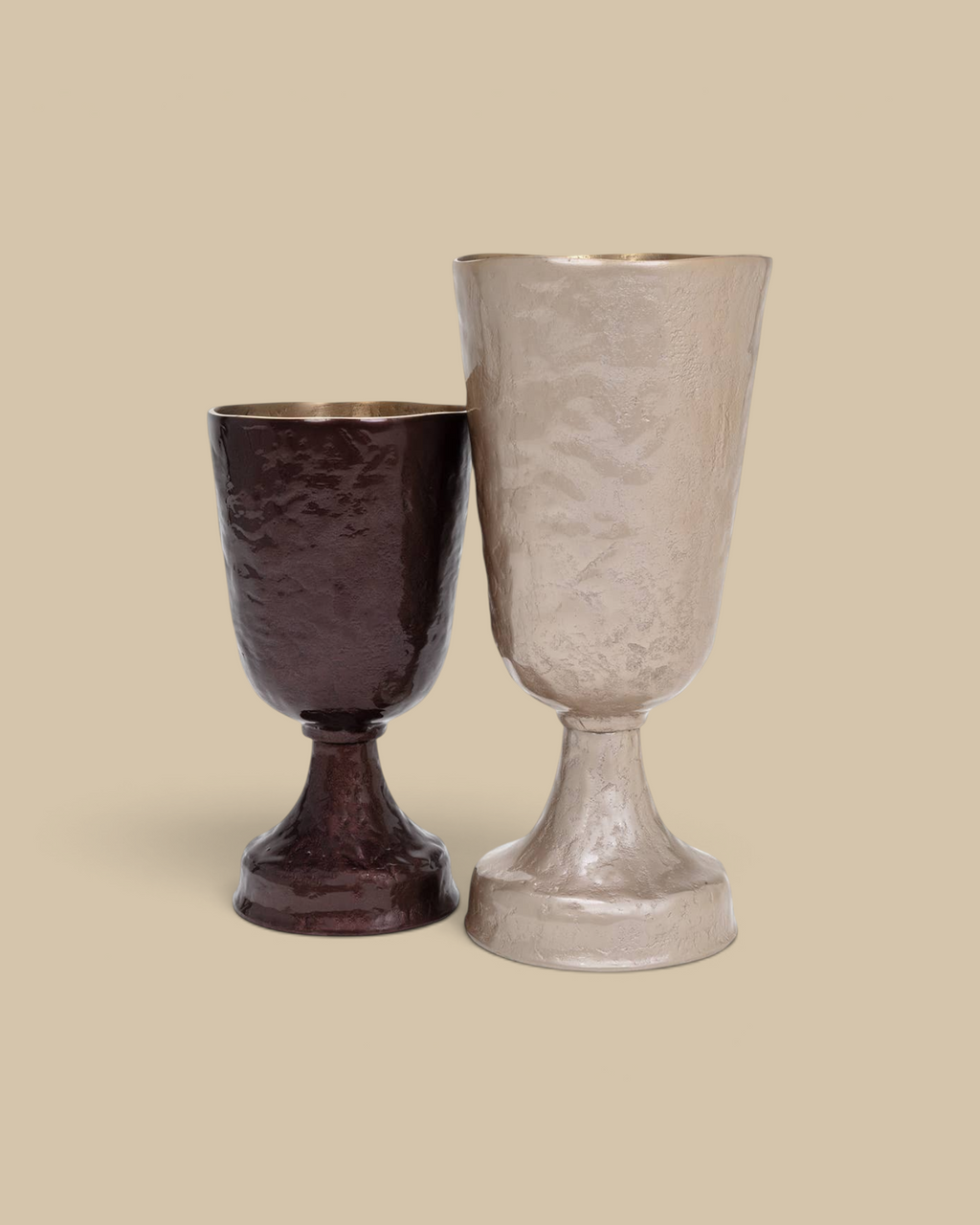 Homestyle Collective Verlix tall and short aluminum urns with hammered silver and dark brown textured finishes.