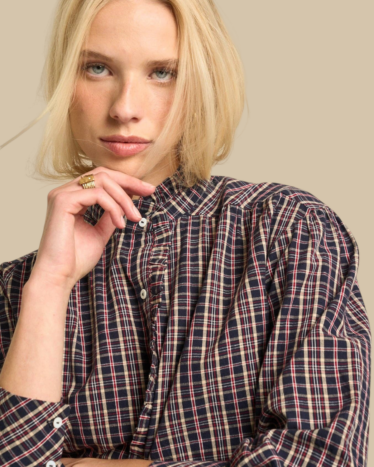 Homestyle Collective Alexa cotton blouse in navy, burgundy, and cream gingham with a ruffled neckline and buttons.