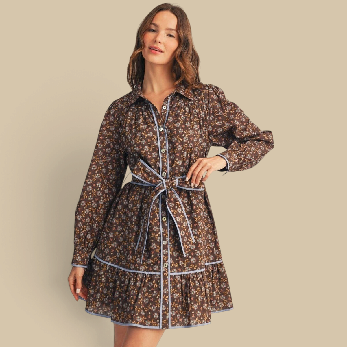Homestyle Collective brown floral cotton dress with waist tie, button-down front, and blue contrast piping detail.