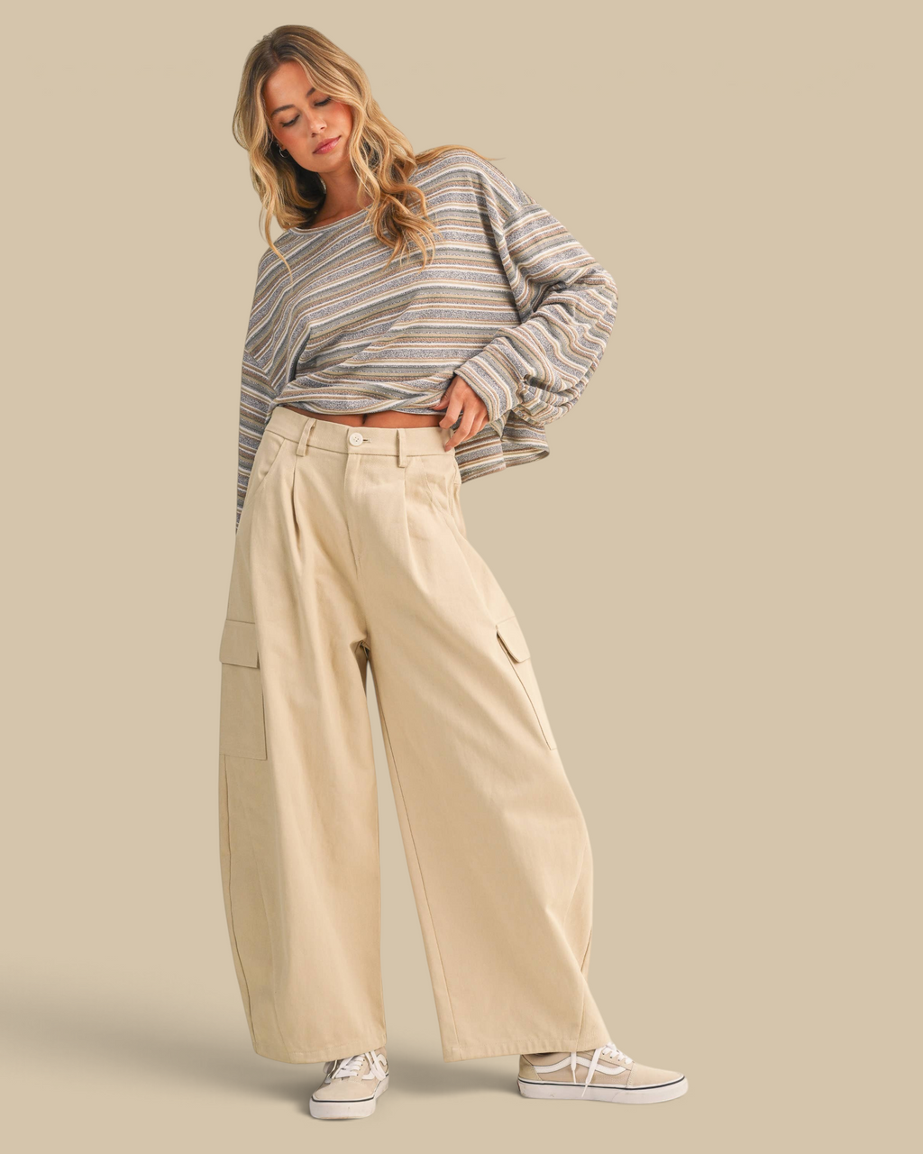 Homestyle Collective beige cotton twill cargo barrel pants with a high-waisted wide-leg fit on a blonde model.