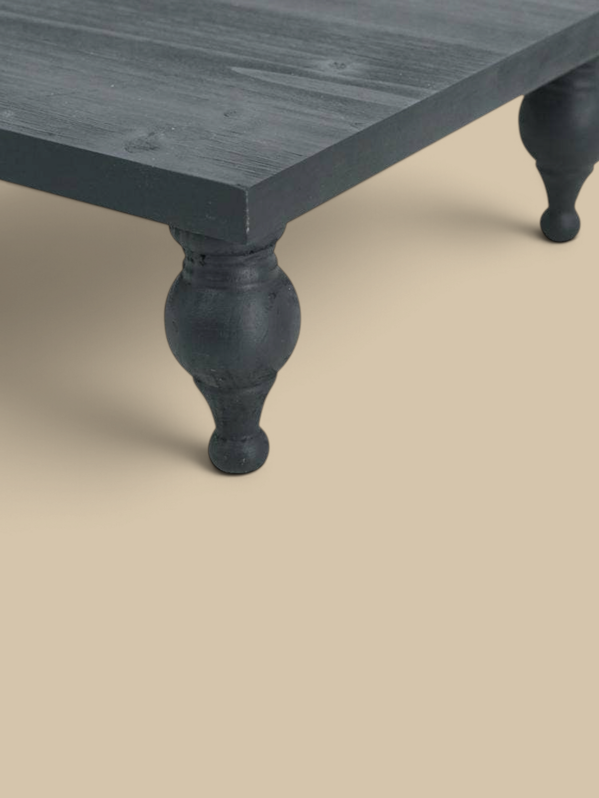 Homestyle Collective black wooden square riser with decorative turned legs for farmhouse home decor displays.