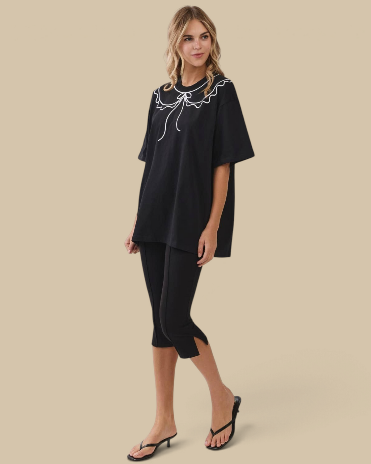 Homestyle Collective black oversized cotton tunic tee featuring a white scalloped collar and relaxed fit
