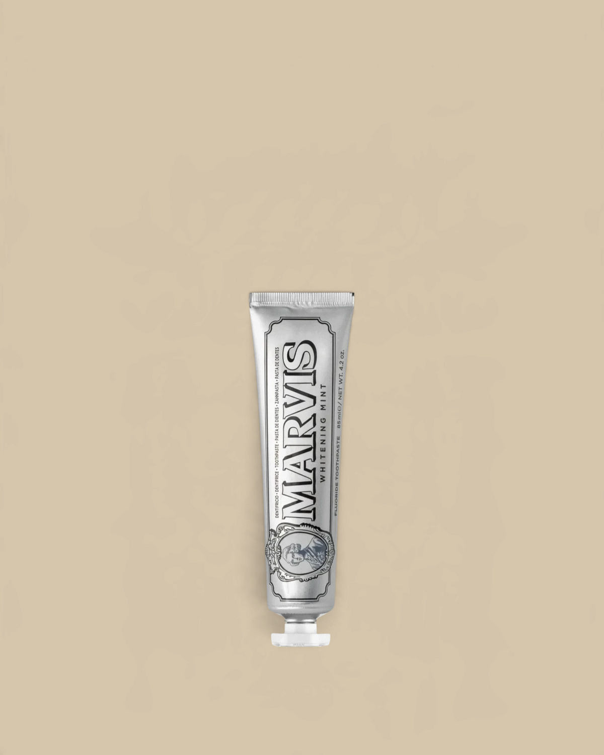 Homestyle Collective Marvis Whitening Mint toothpaste in a classic silver travel-size tube with vintage typography.