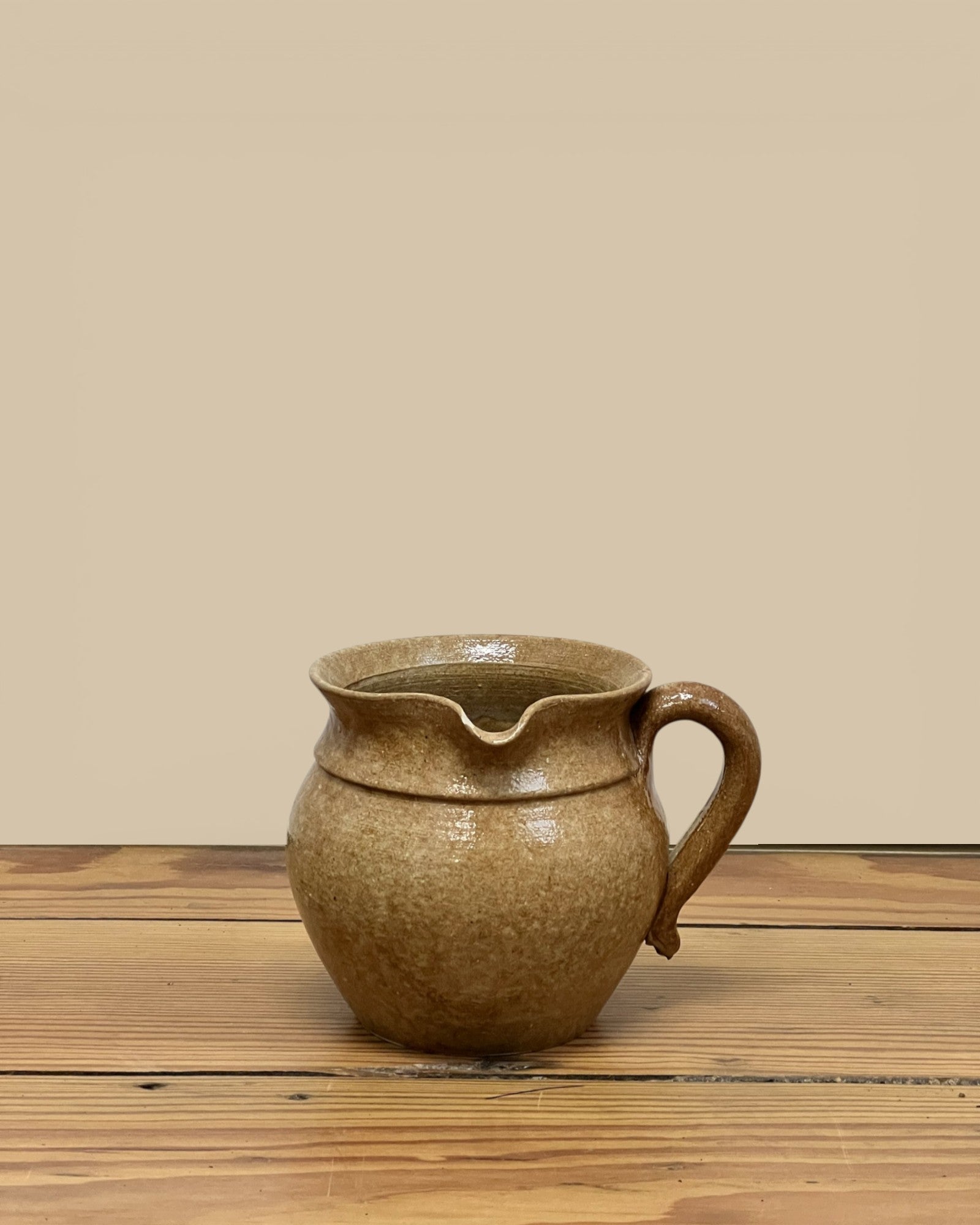 Stamped Hand Spun Pottery Pitcher