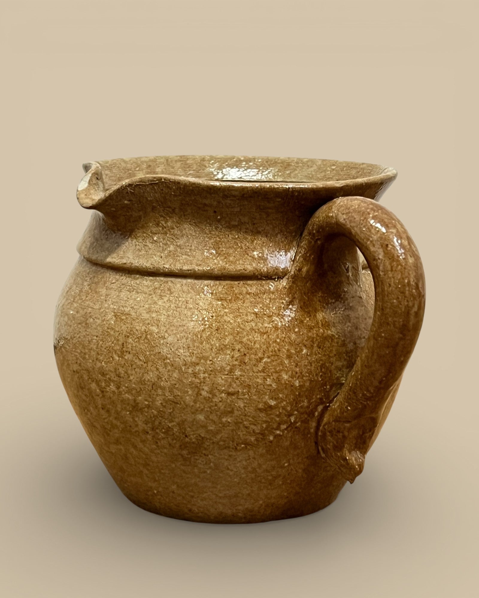 Stamped Hand Spun Pottery Pitcher