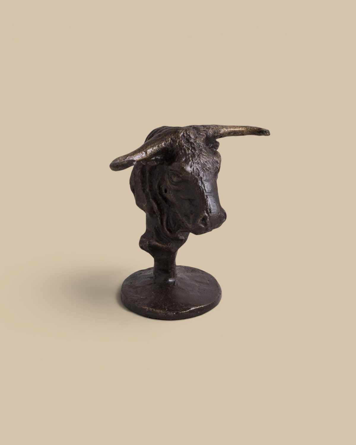 Homestyle Collective bronzed bull bust pen holder with a tarnish-resistant finish for desk organization.