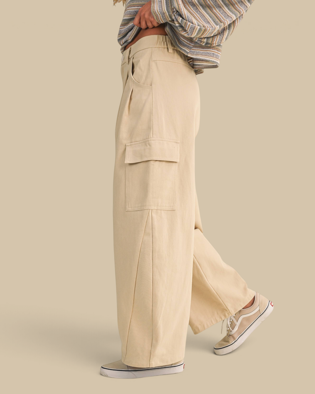 Homestyle Collective beige cotton twill cargo barrel pants with a high-waisted wide-leg fit and side pockets.