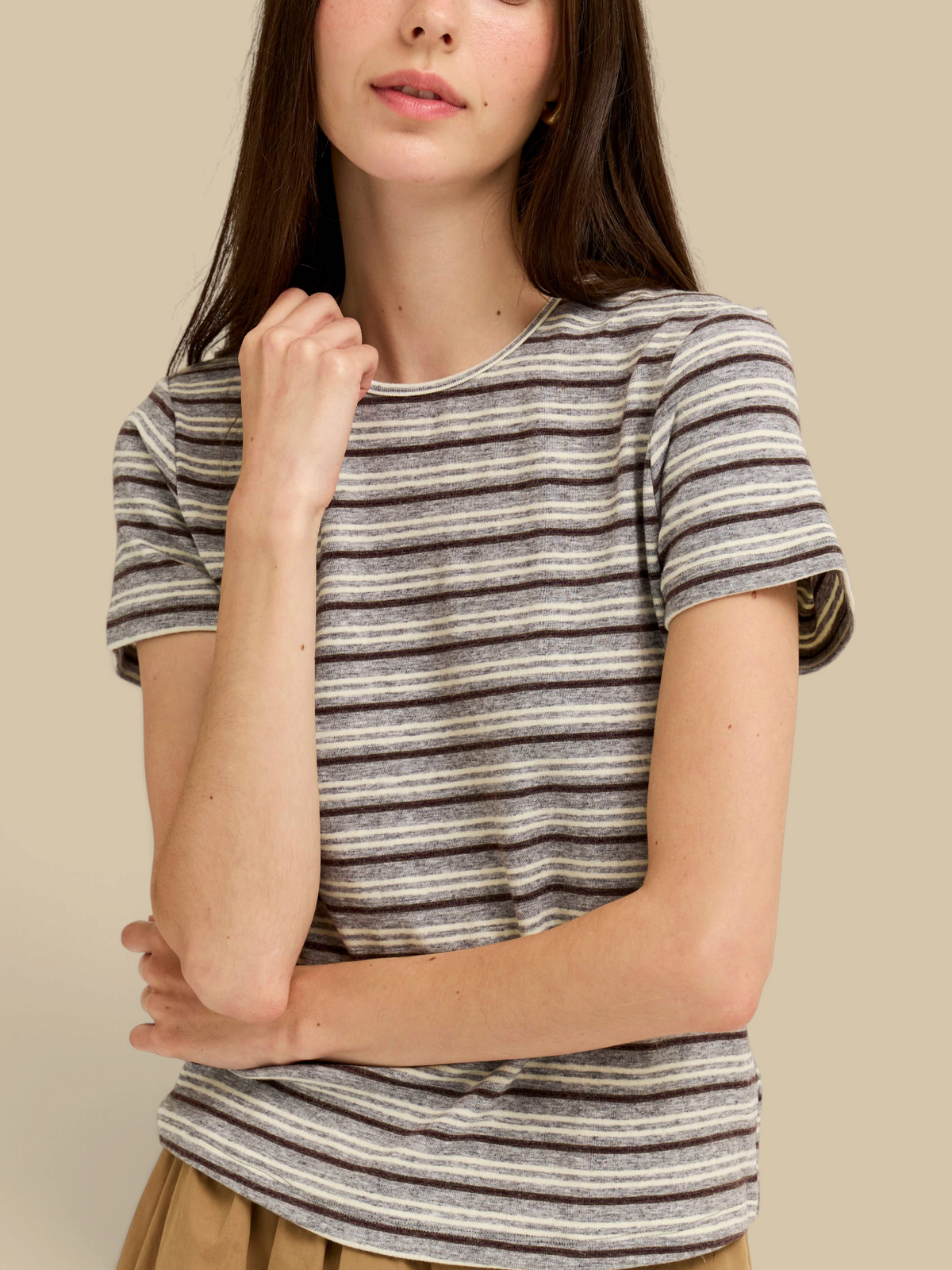 Homestyle Collective light grey striped jersey t-shirt with short sleeves and a round neck worn by a woman