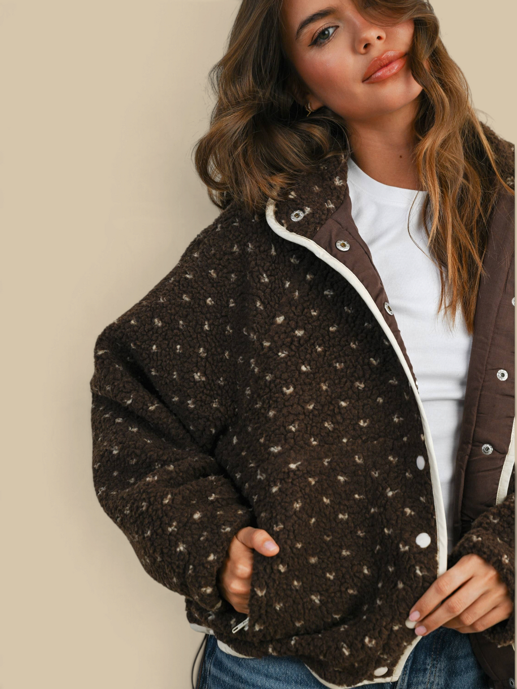 Homestyle Collective brown high pile fleece puffer jacket with quilted details worn by a woman