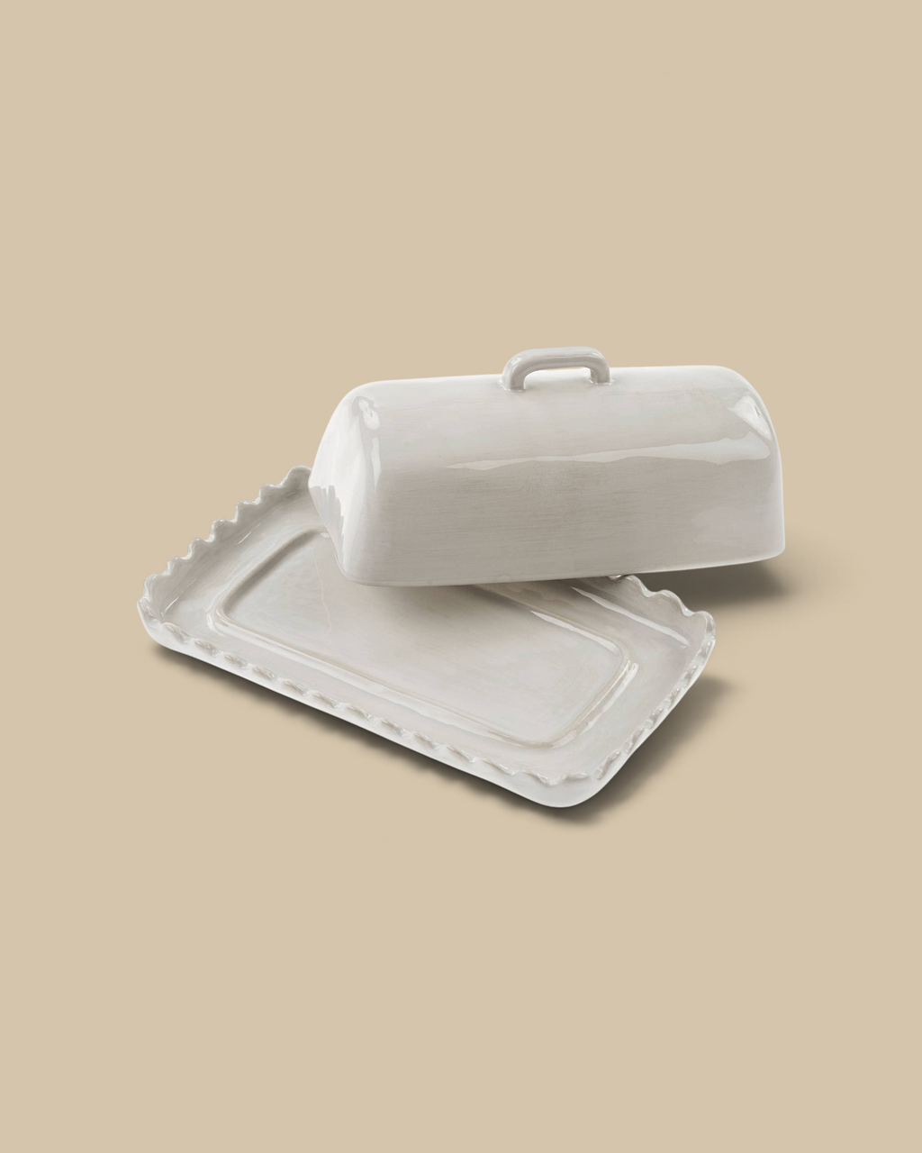 Homestyle Collective handcrafted stoneware butter dish with whimsical scalloped edges and a textured neutral glaze.