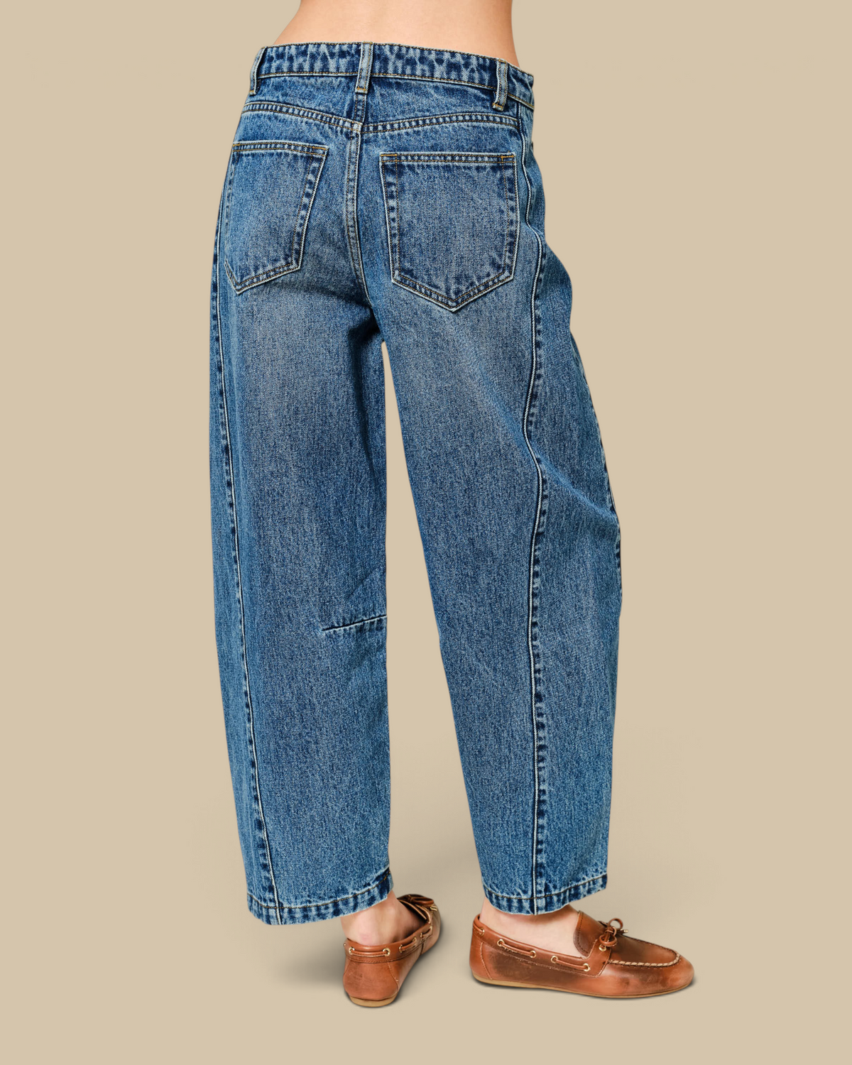 Homestyle Collective mid-rise cropped barrel jeans in blue denim with seam detailing and back patch pockets