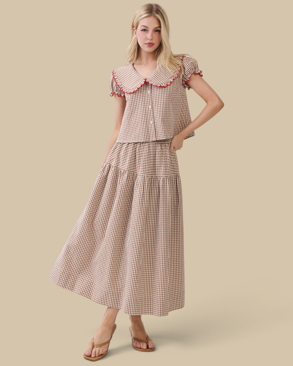 Homestyle Collective two-piece gingham set featuring a brown blouse with a scalloped Peter Pan collar and maxi skirt.