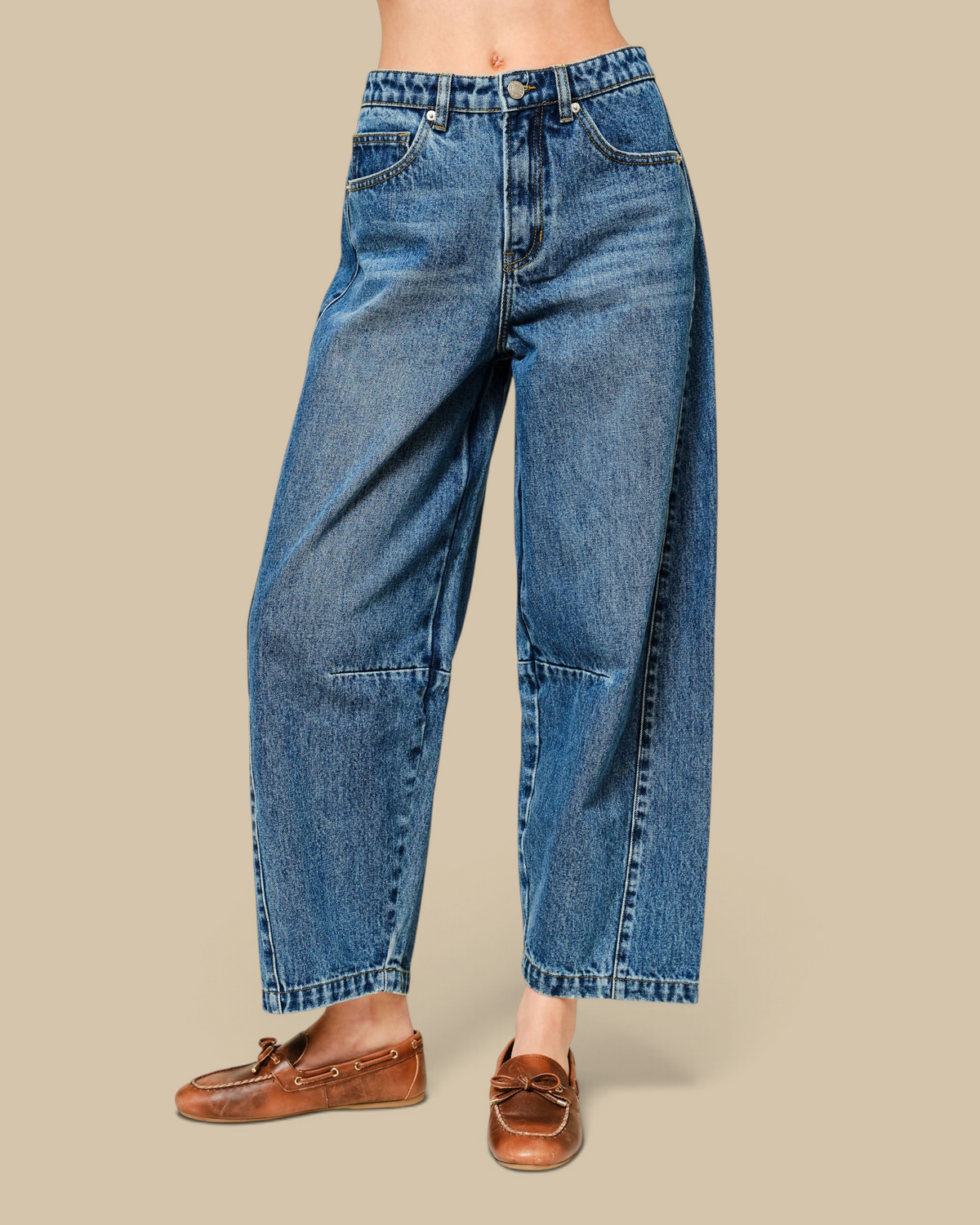 Homestyle Collective mid-rise cropped barrel jeans in medium wash denim with seam detailing and wide leg silhouette