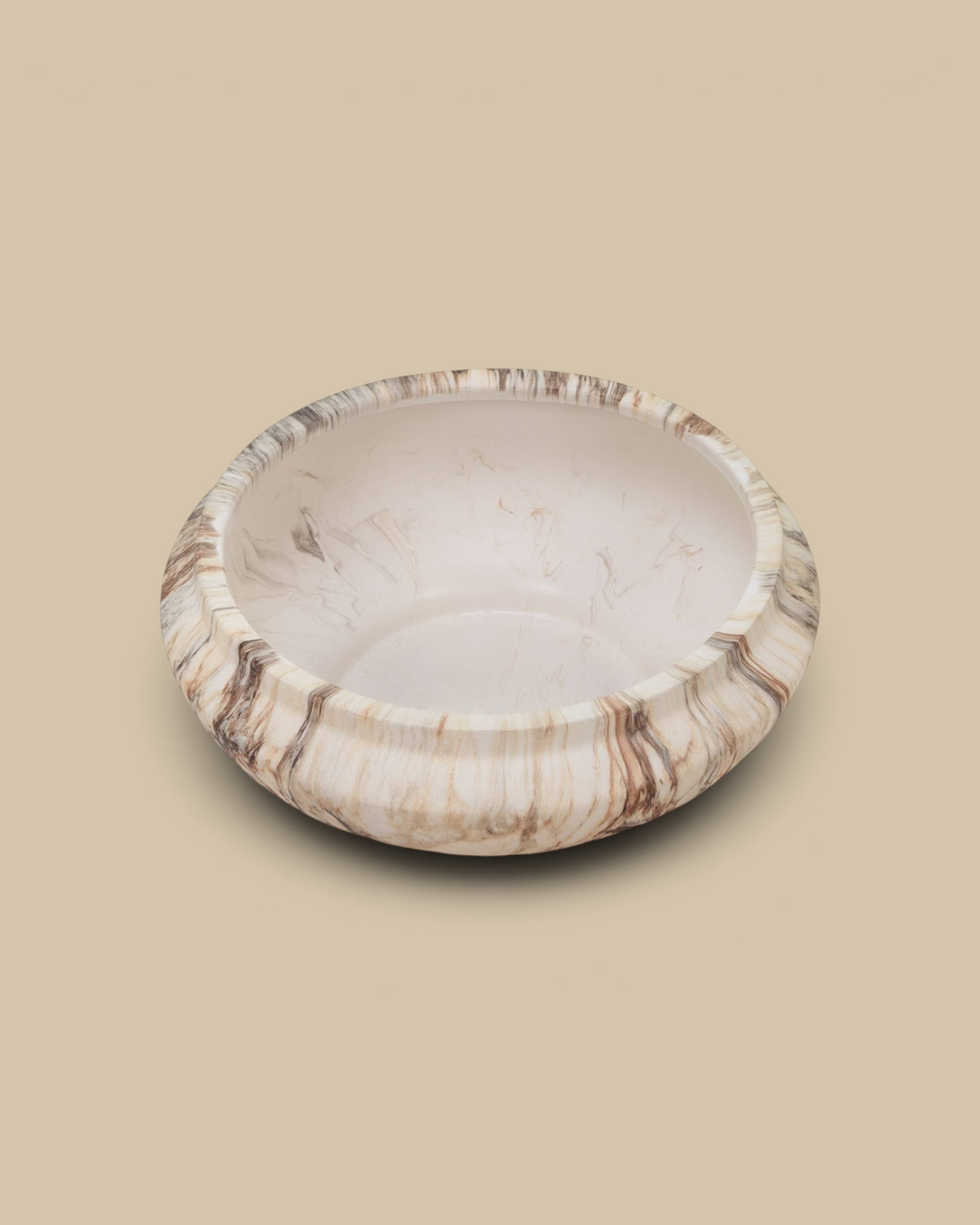 Homestyle Collective Fenmir round ceramic decorative bowl featuring a luxurious brown and beige marble finish.