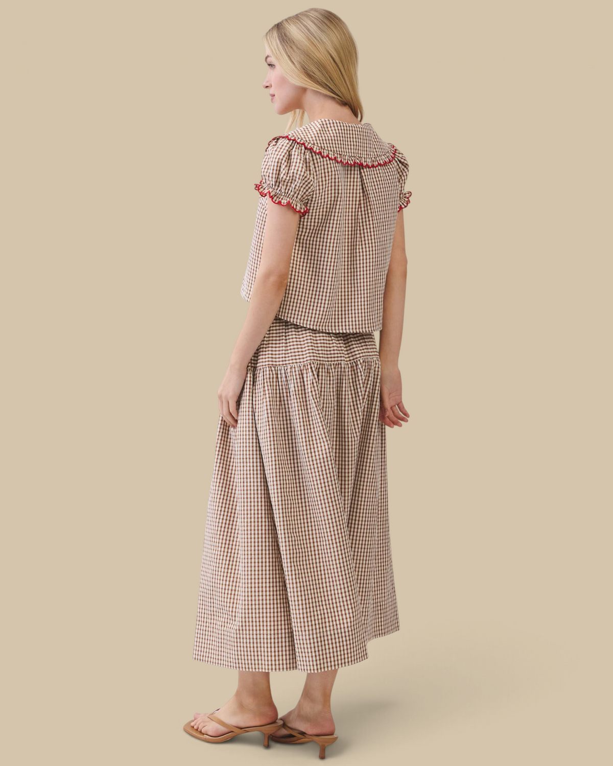 Homestyle Collective two-piece brown gingham set with Peter Pan collar blouse and flowy maxi skirt, back view