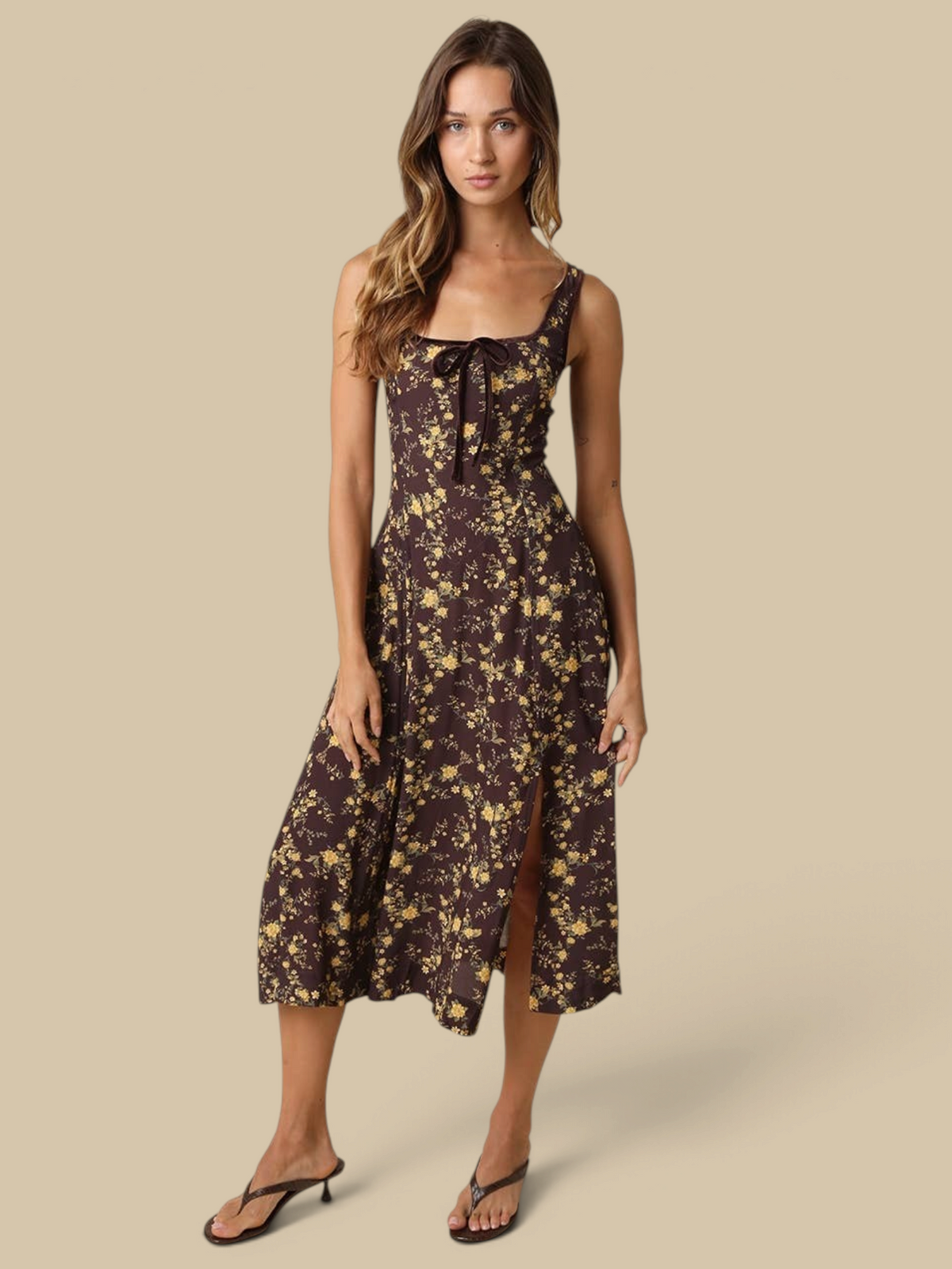 Homestyle Collective Sofia floral midi dress with square neckline, front bow, and side slit in brown and yellow