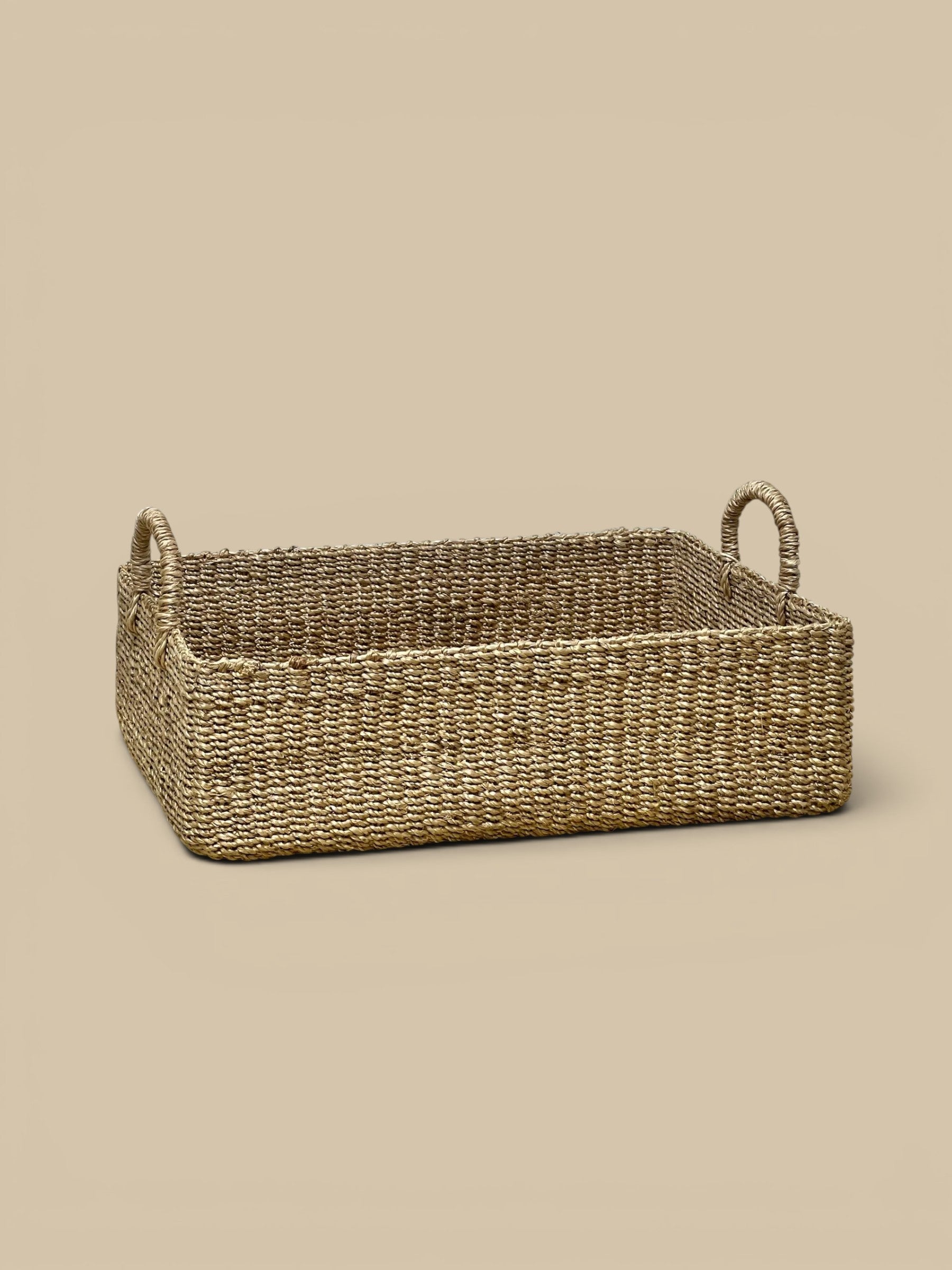 Homestyle Collective set of 2 handwoven abaca rectangular trays with rounded handles, natural woven texture.