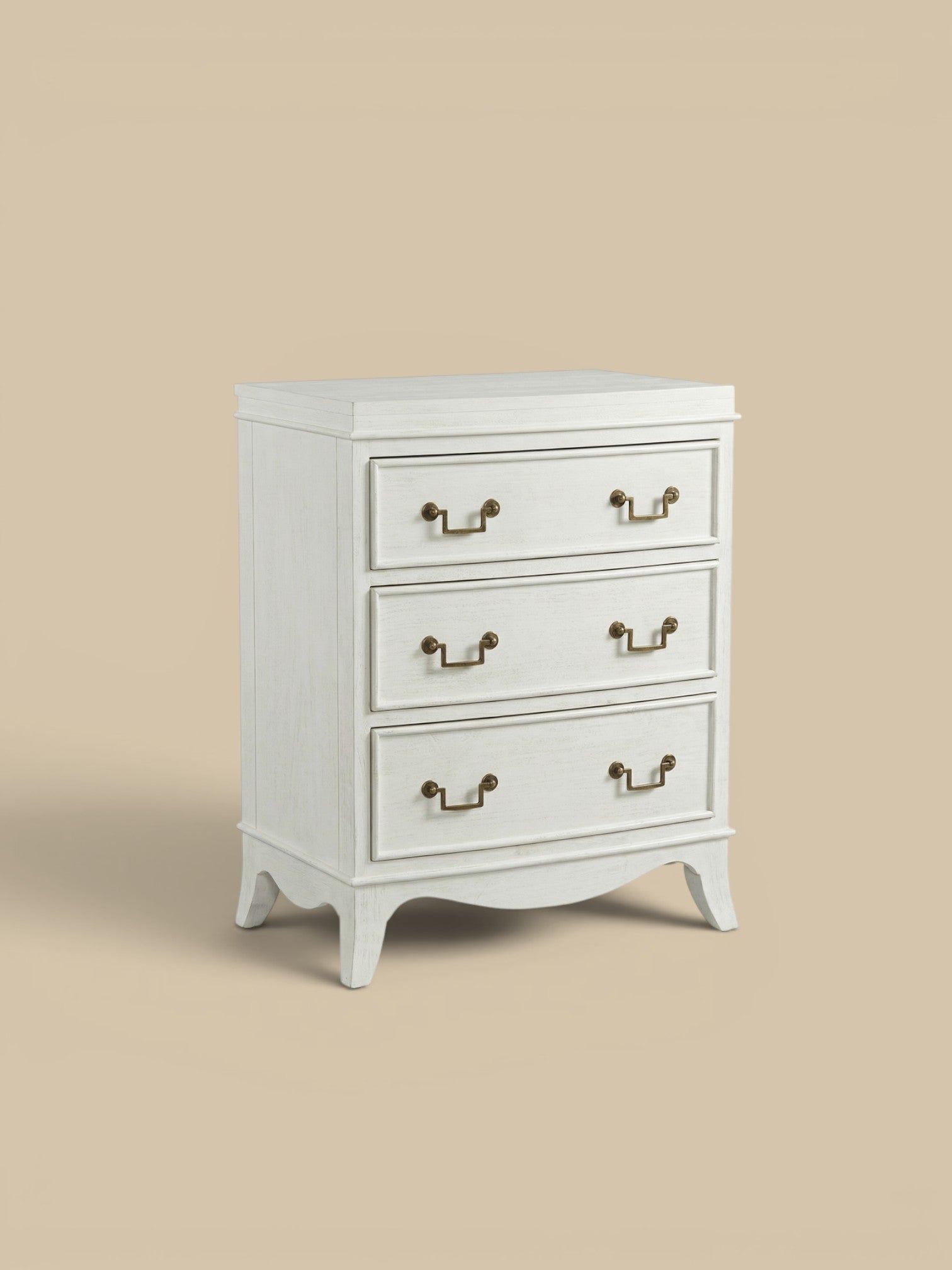 Homestyle Collective Amelia white distressed wood nightstand with three drawers and brass hardware.