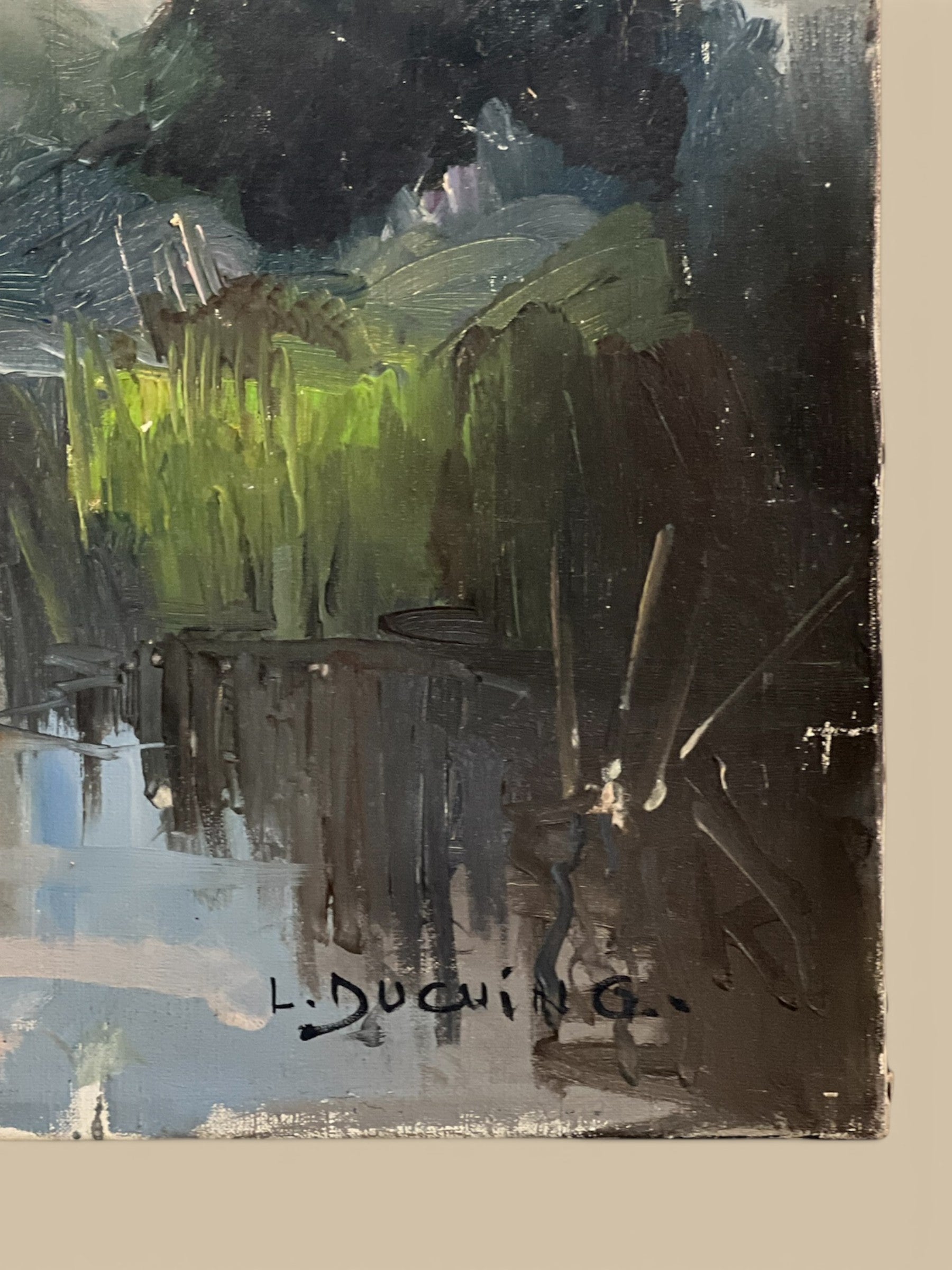 Homestyle Collective antique oil painting of a serene landscape with a river reflecting trees and sky. Impressionistic style.