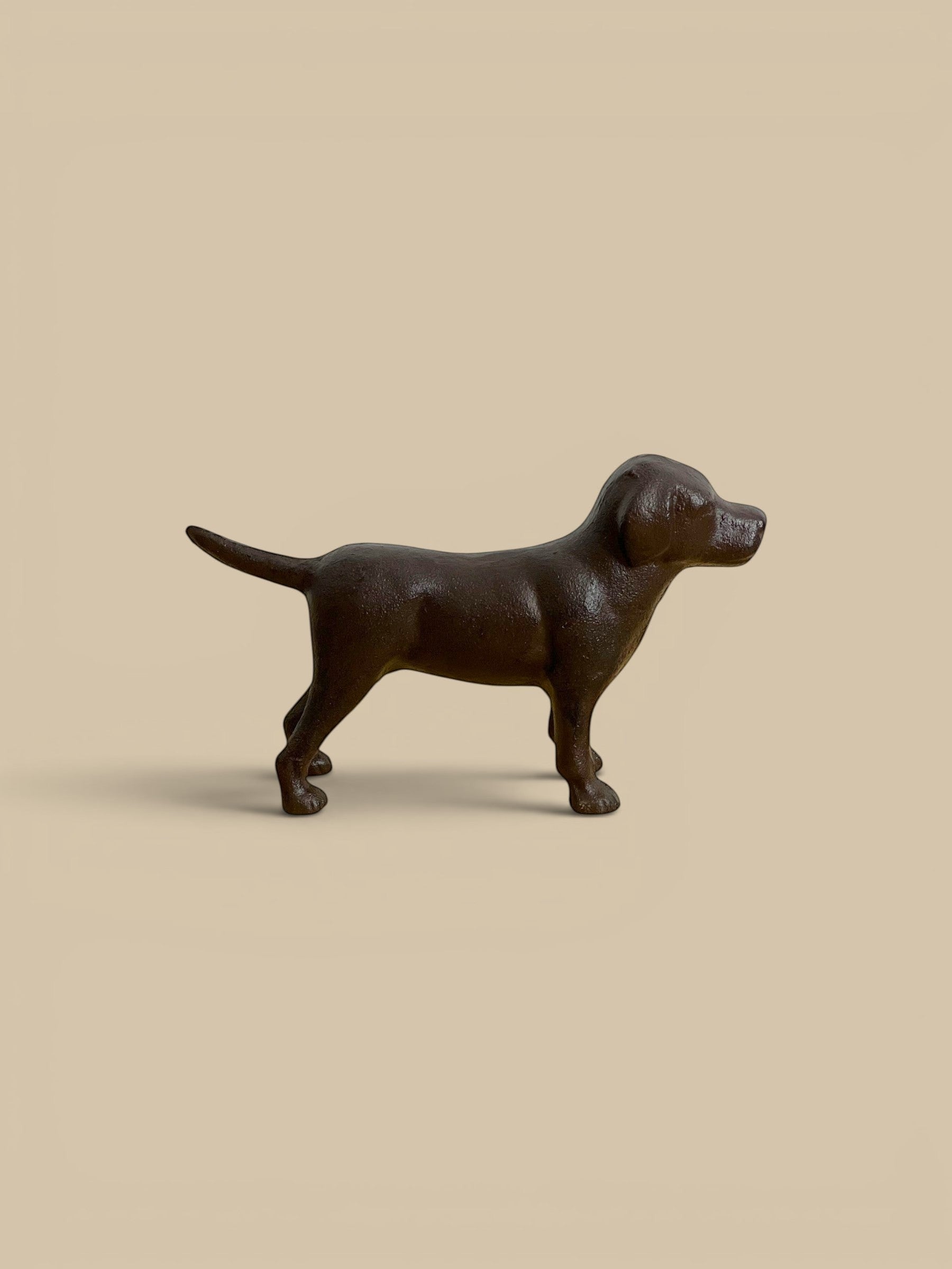 Homestyle Collective black cast iron Labrador figurine with a textured finish and friendly standing pose.