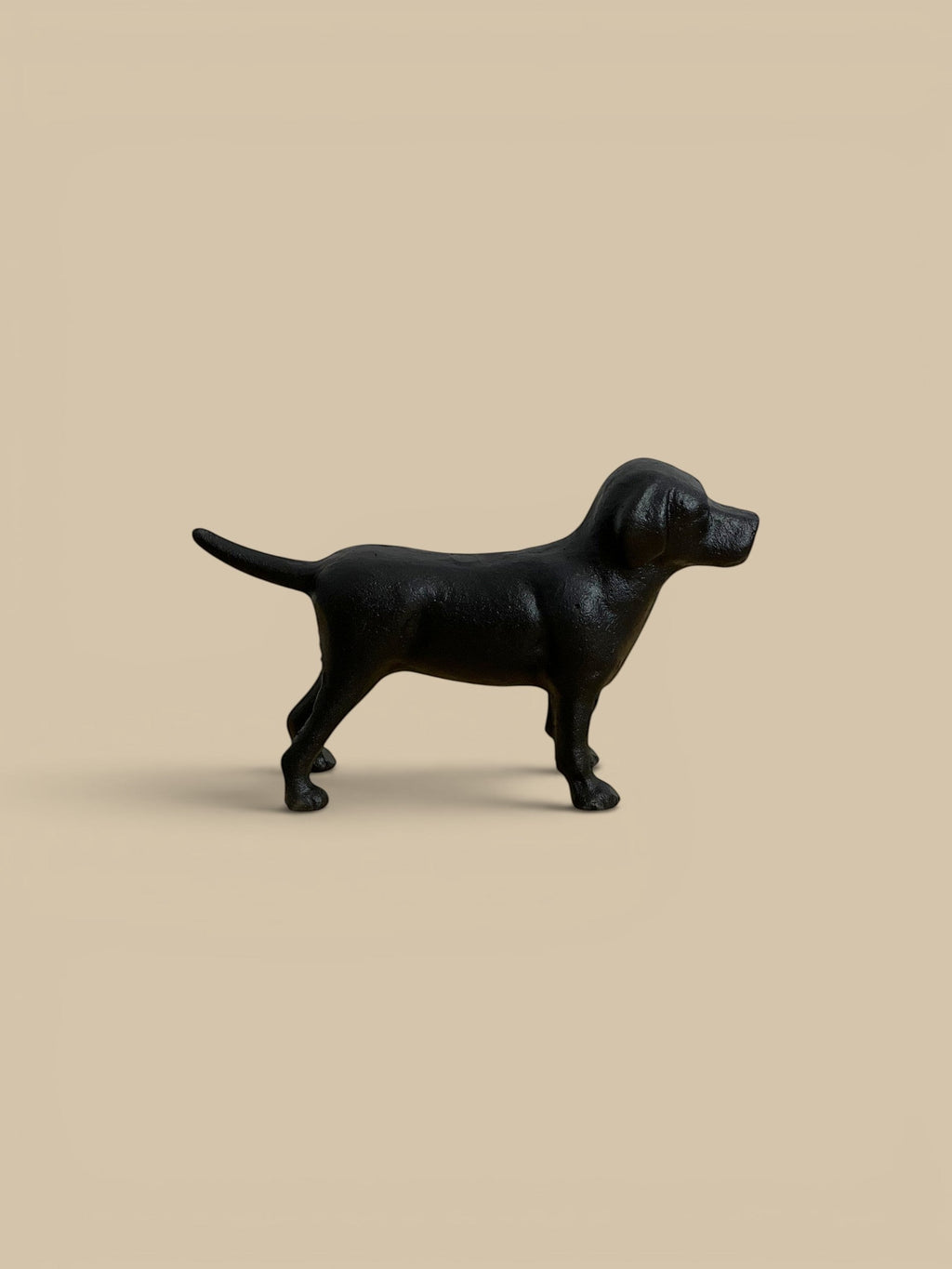 Homestyle Collective black cast iron Labrador figurine with a classic silhouette and textured finish.