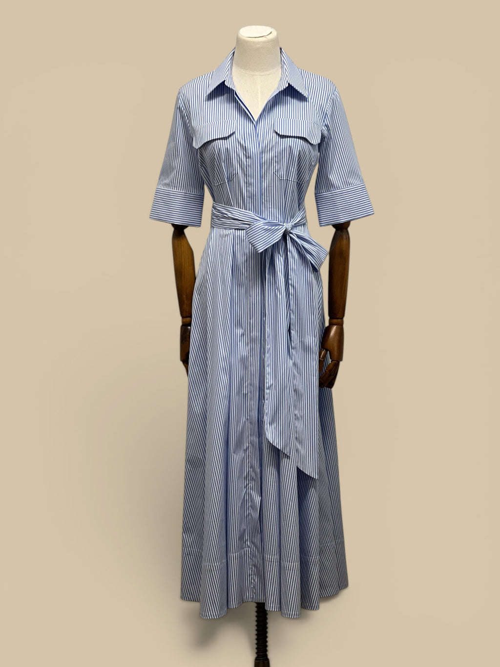 Homestyle Collective blue and white pinstripe midi shirt dress with tie waist and short sleeves.