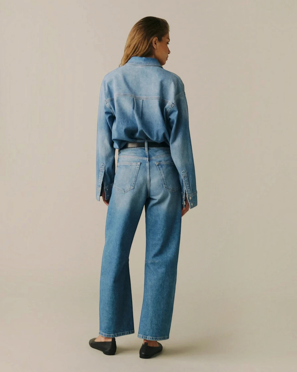 Homestyle Collective BNA soft curve barrel jeans in Sadie medium wash denim, back view on a model