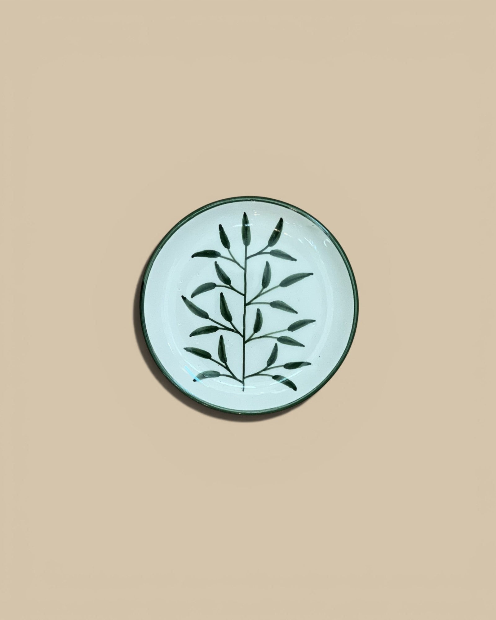 Homestyle Collective 5" round stoneware plate with hand-painted botanical design in dark green on cream.