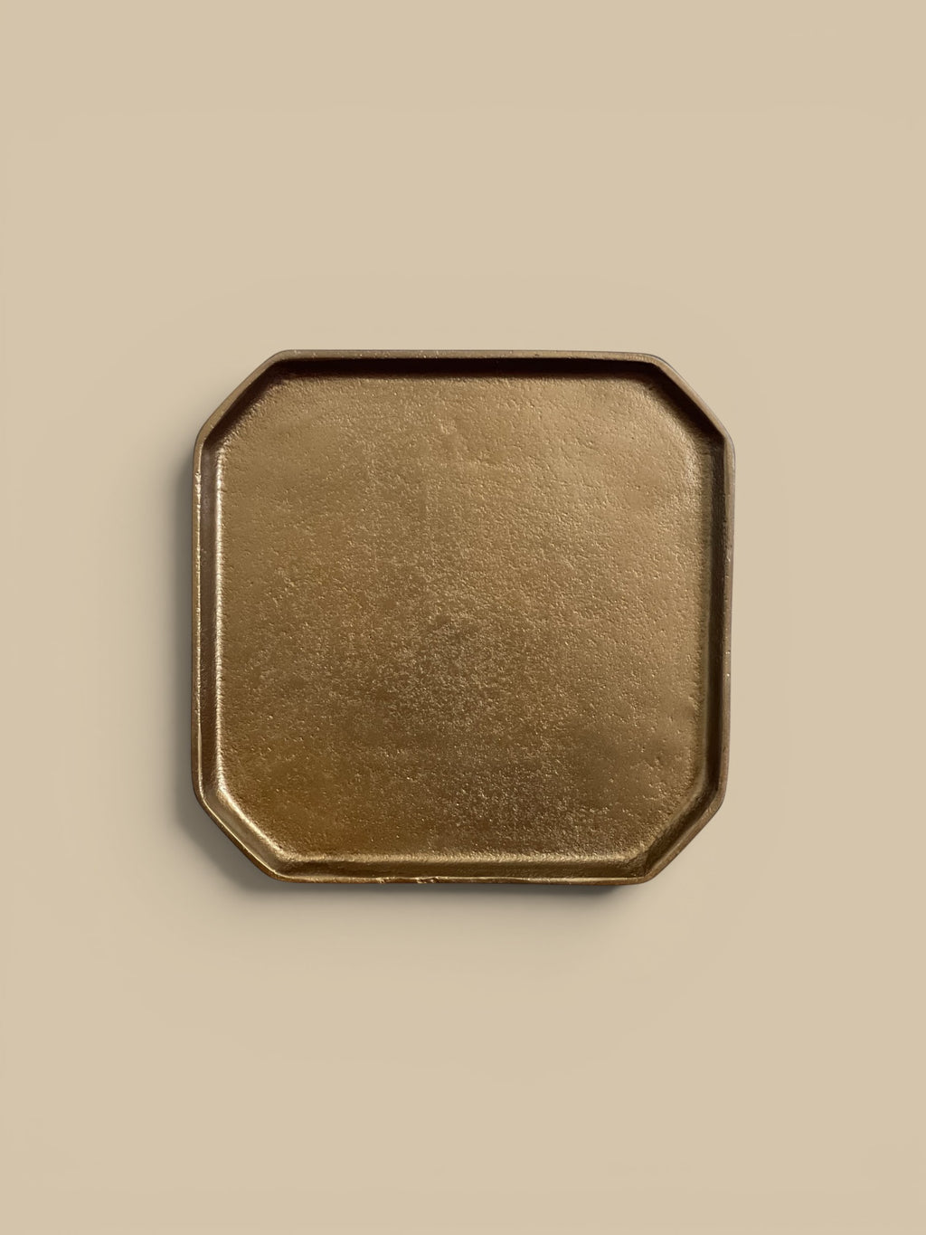 Homestyle Collective brass octagonal aluminum tray, versatile for keys, jewelry, or as a centerpiece base.