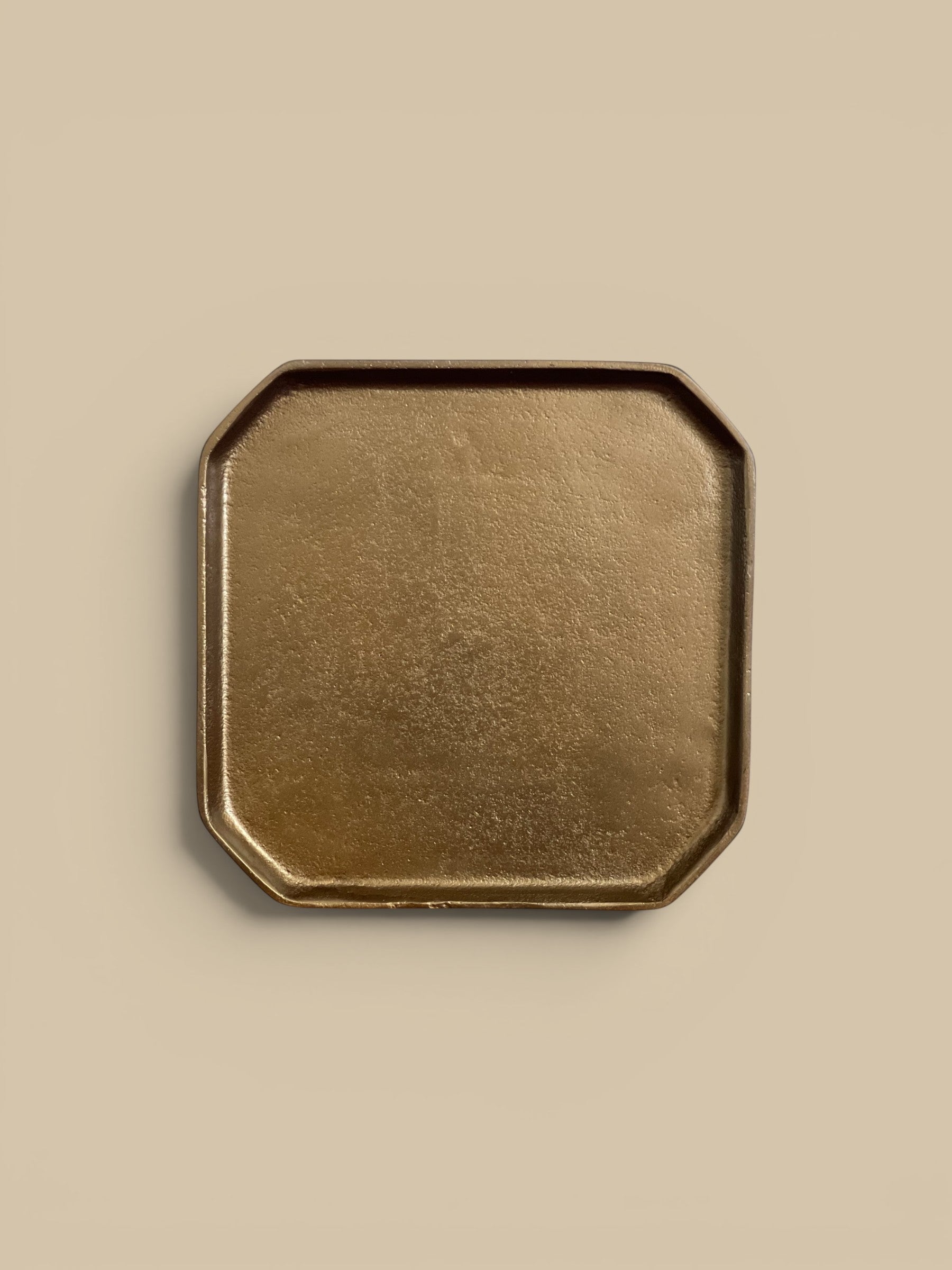 Homestyle Collective brass octagonal aluminum tray, versatile for keys, jewelry, or as a centerpiece base.