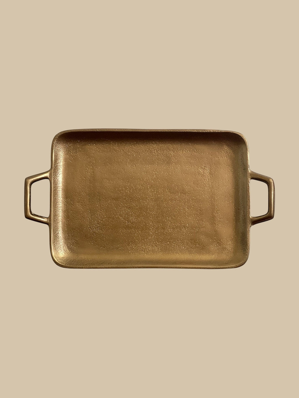 Homestyle Collective brass rectangular tray with integrated handles, ideal for vanity, bar, or coffee table styling.