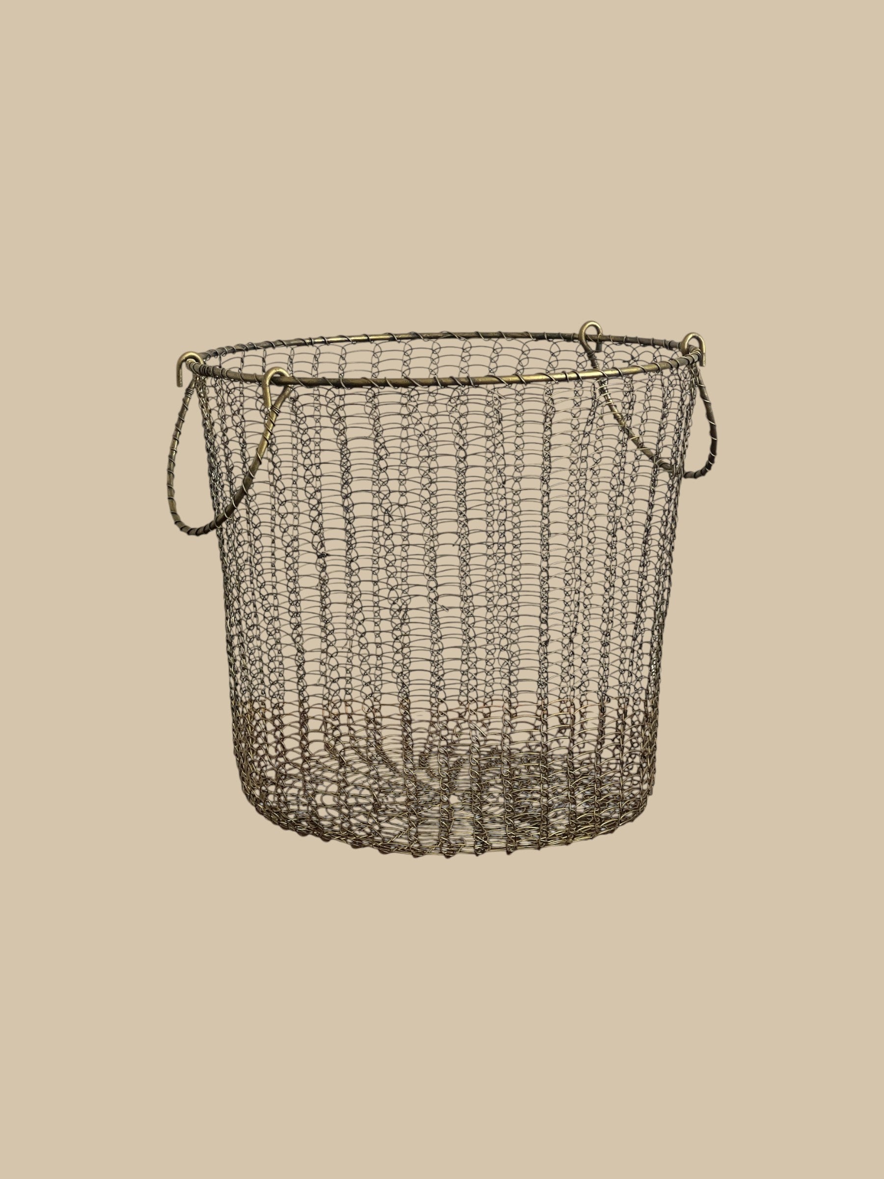 Homestyle Collective Moana brass wire baskets, set of 3, with handles. Open weave design.