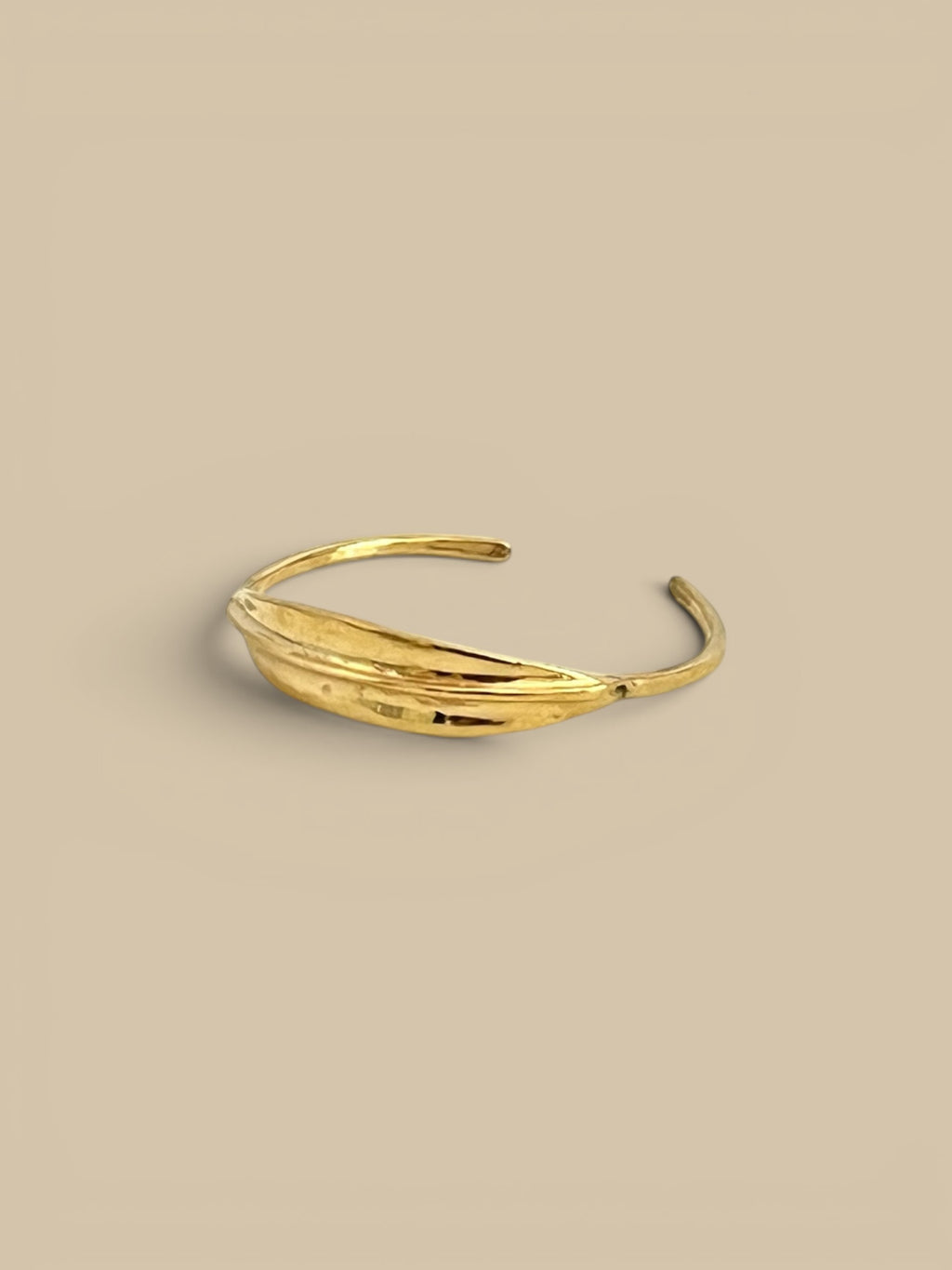 Homestyle Collective bronze ridge ID cuff bracelet with sculptural ridge detail, cast from wax.