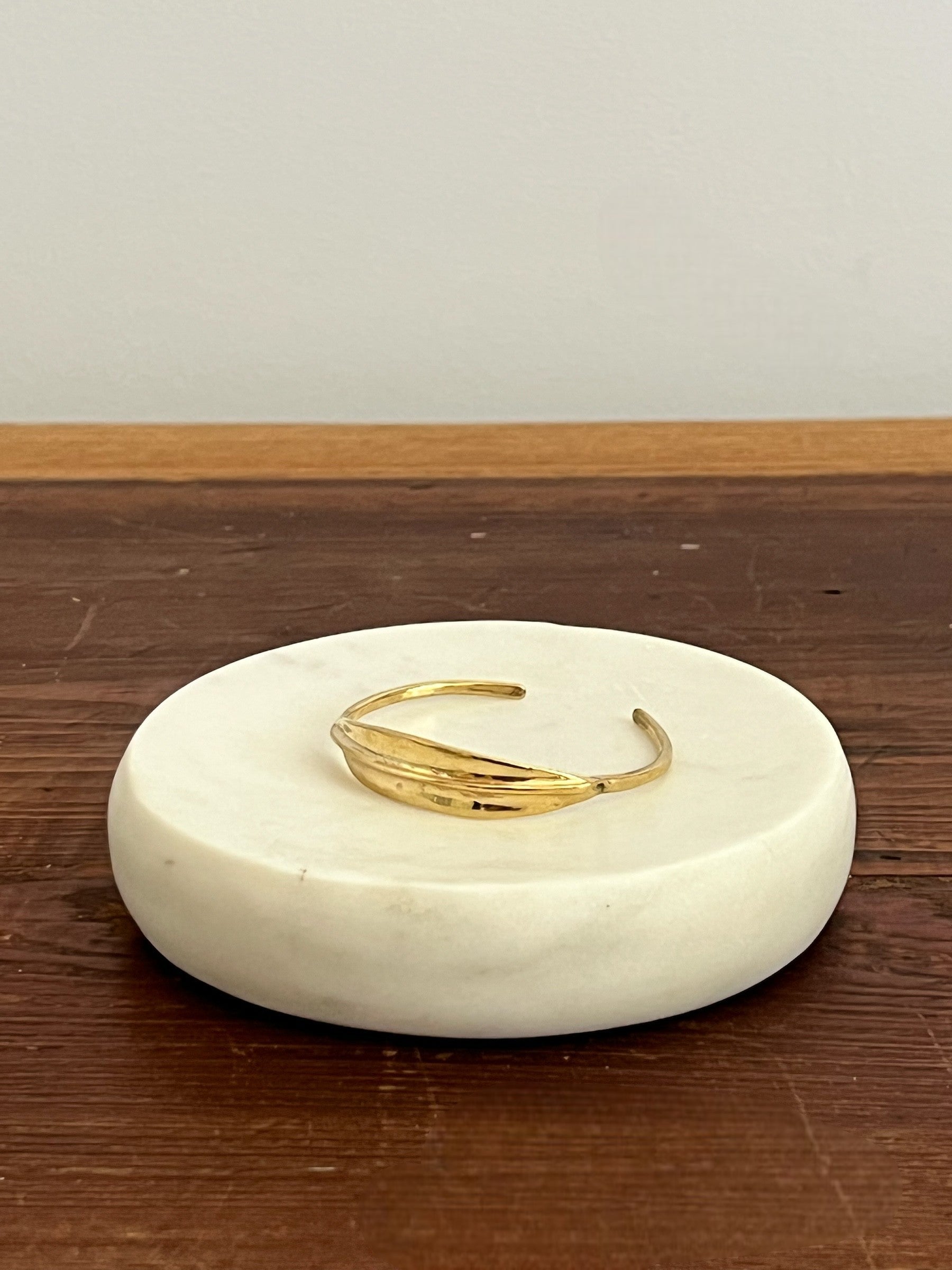 Homestyle Collective bronze ridge ID cuff bracelet with sculptural ridge detail, cast from wax.
