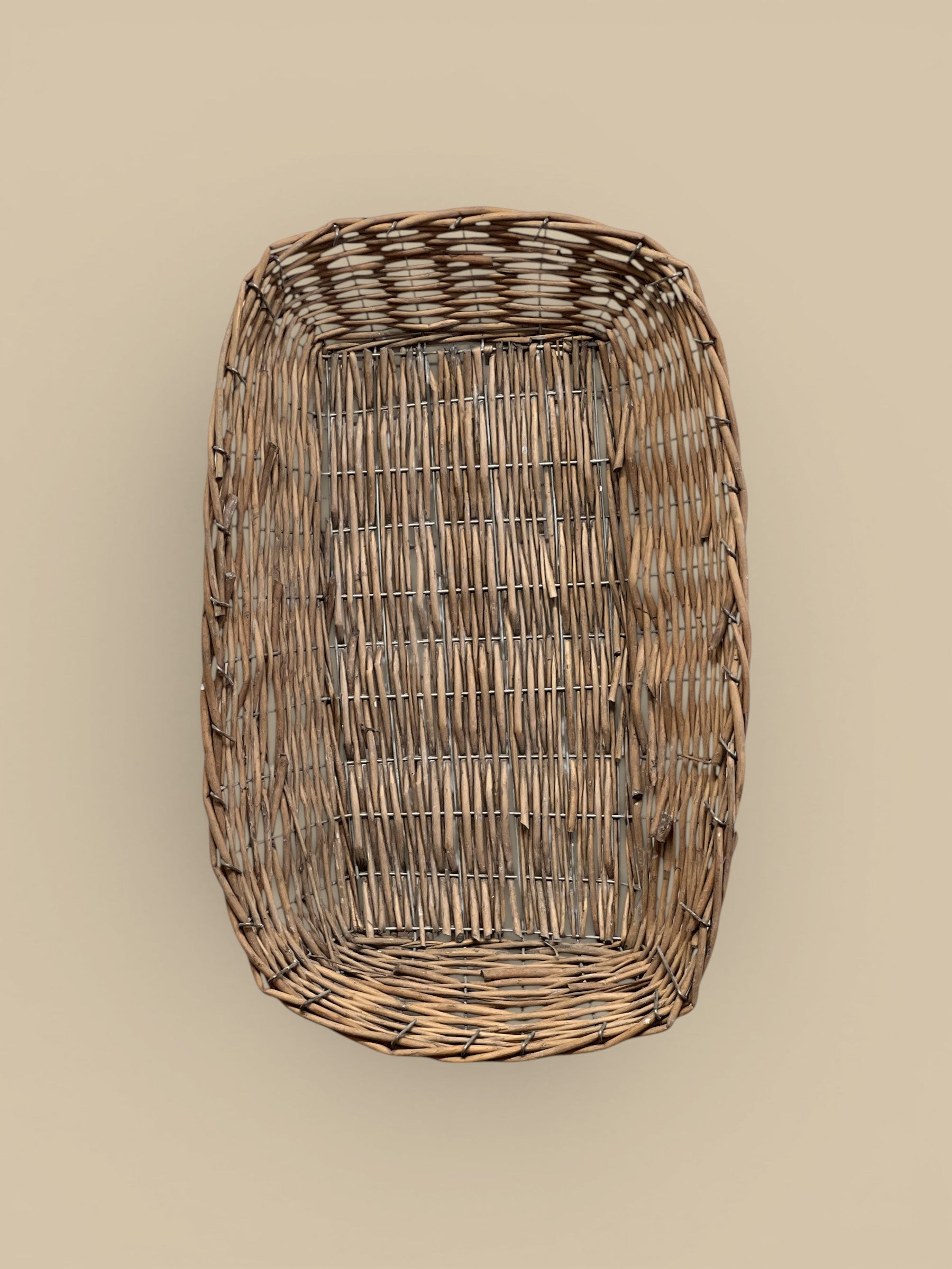 Homestyle Collective brown woven willow rectangular tray, perfect for coffee table styling or everyday catchall.