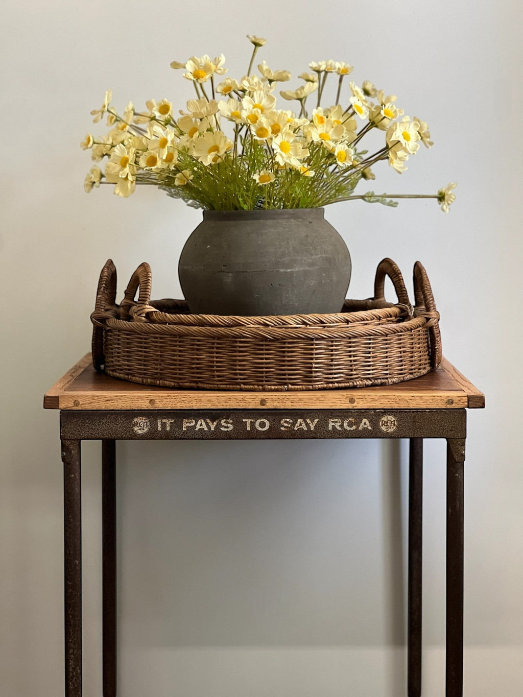 Homestyle Collective buttermilk yellow artificial cosmos flowers in a dark grey vase, bundled in 3 stems.